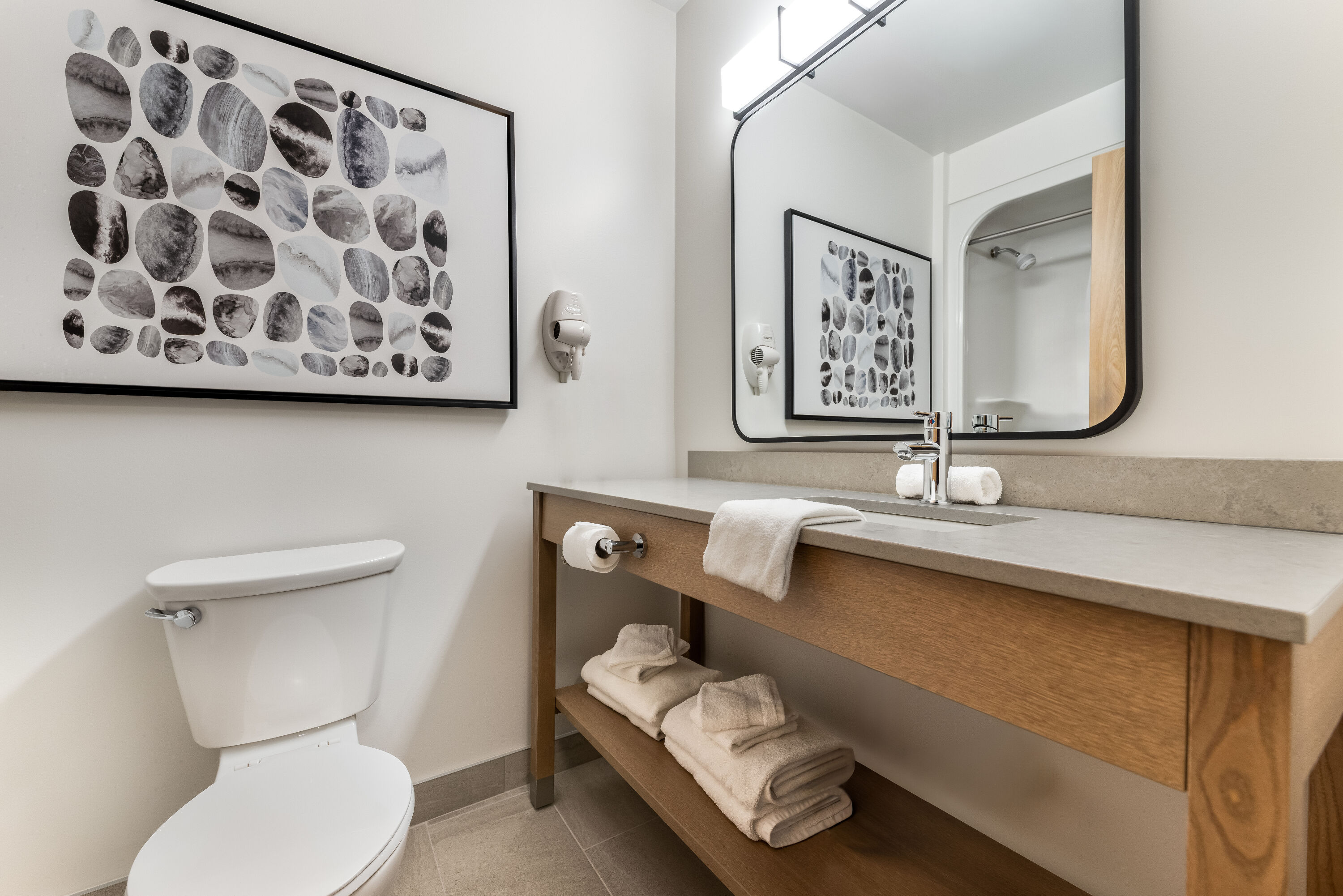 Guest room bath at the Days Inn & Suites by Wyndham Thunder Bay in Thunder Bay, Ontario