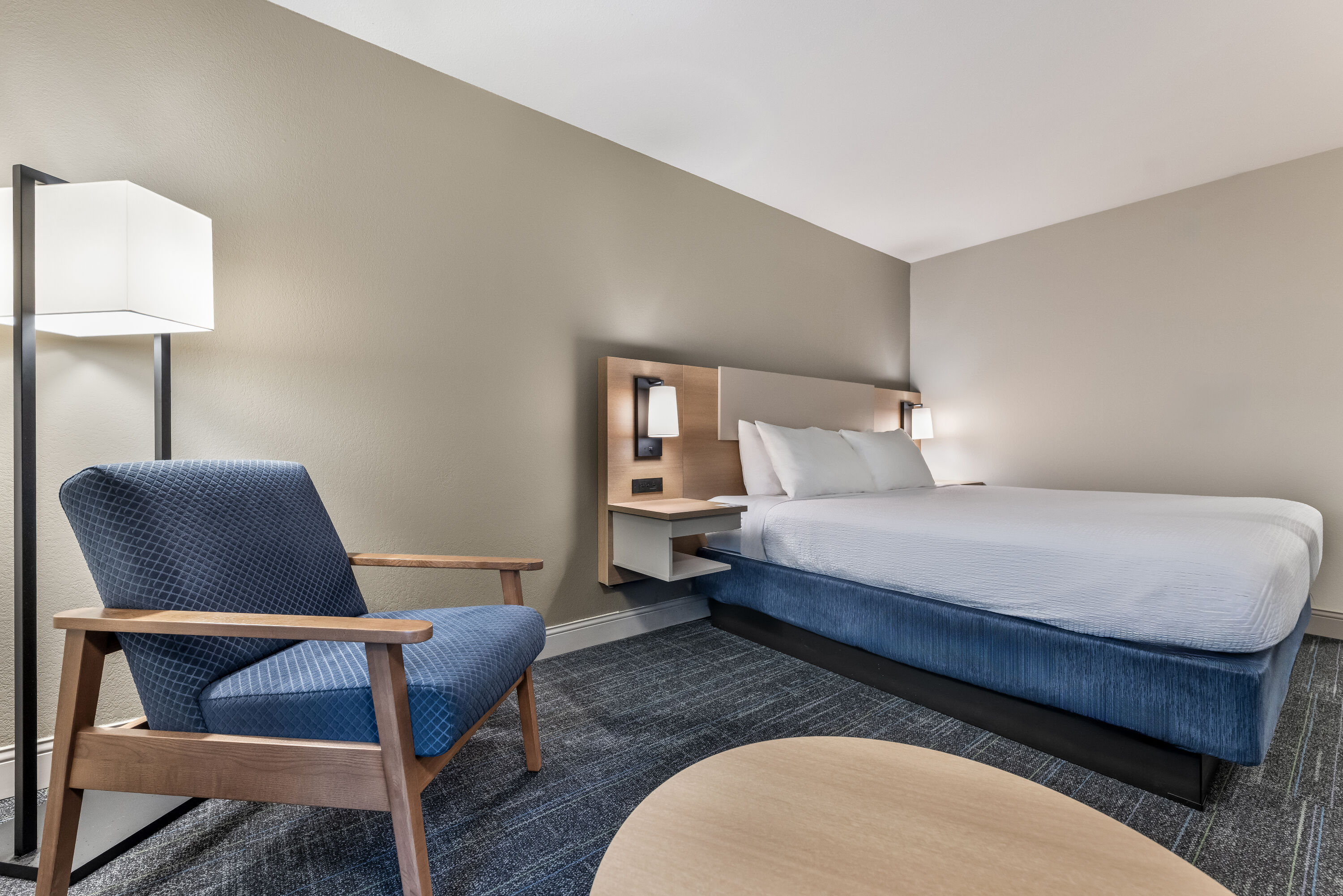 King bed guest room at the Days Inn & Suites by Wyndham Thunder Bay in Thunder Bay, Ontario