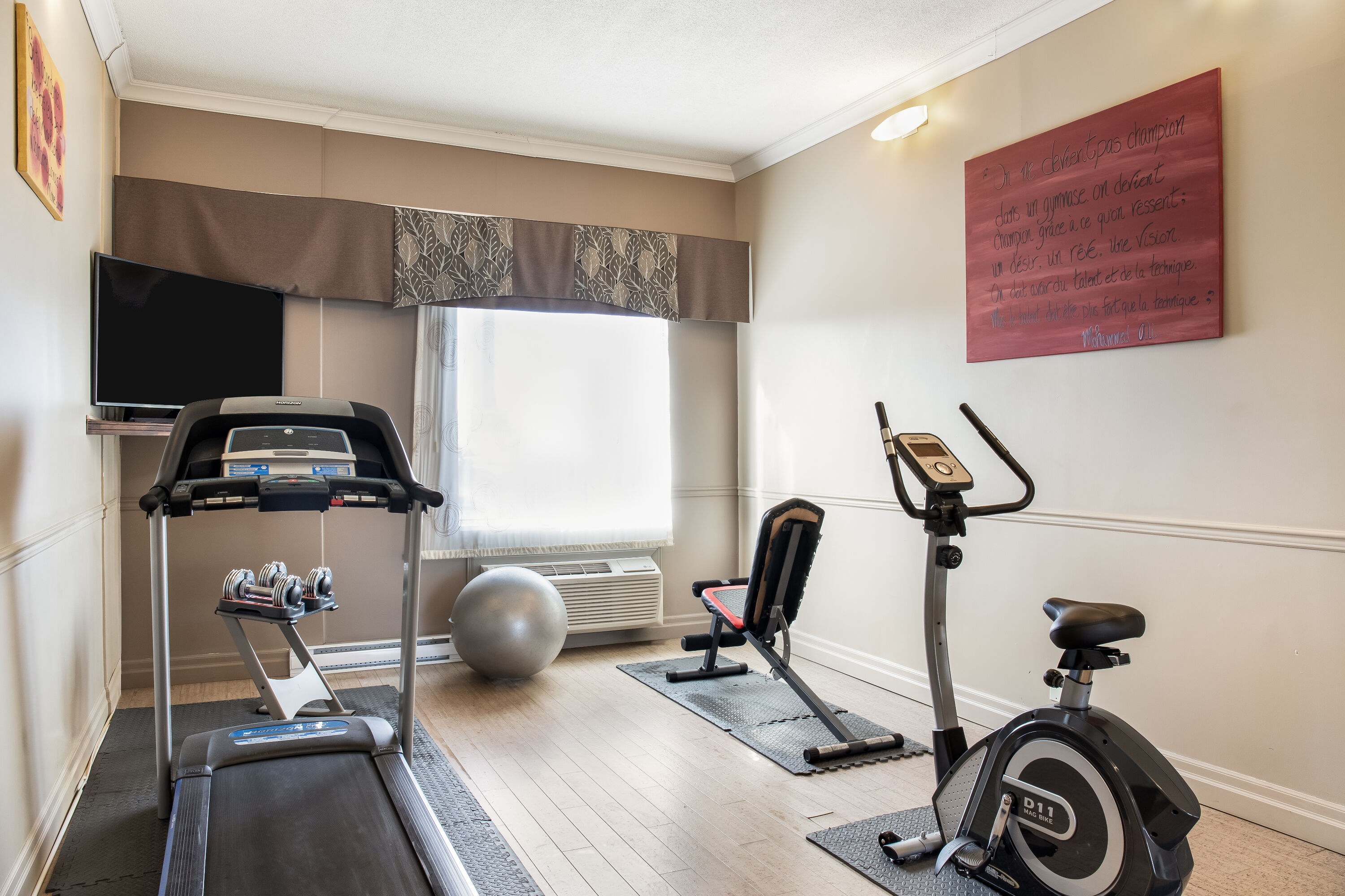 Fitness room at Days Inn by Wyndham Berthierville in Berthierville, Quebec