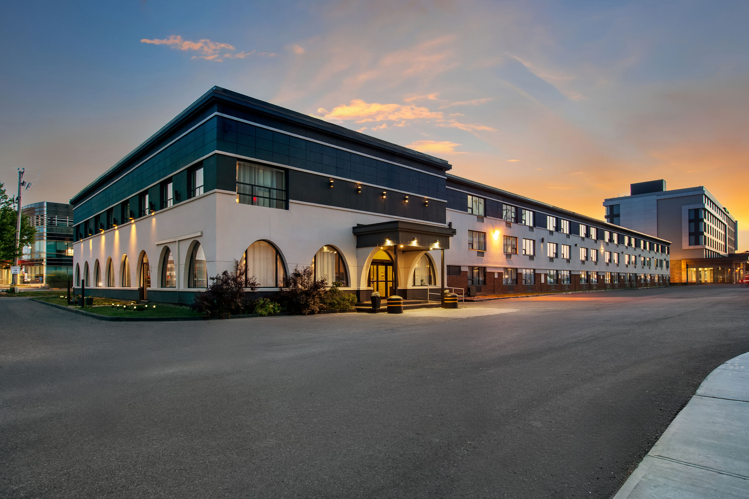 Exterior Dusk Image of Days Inn by Wyndham Montreal Airport Conference Centre hotel in Montreal, Quebec