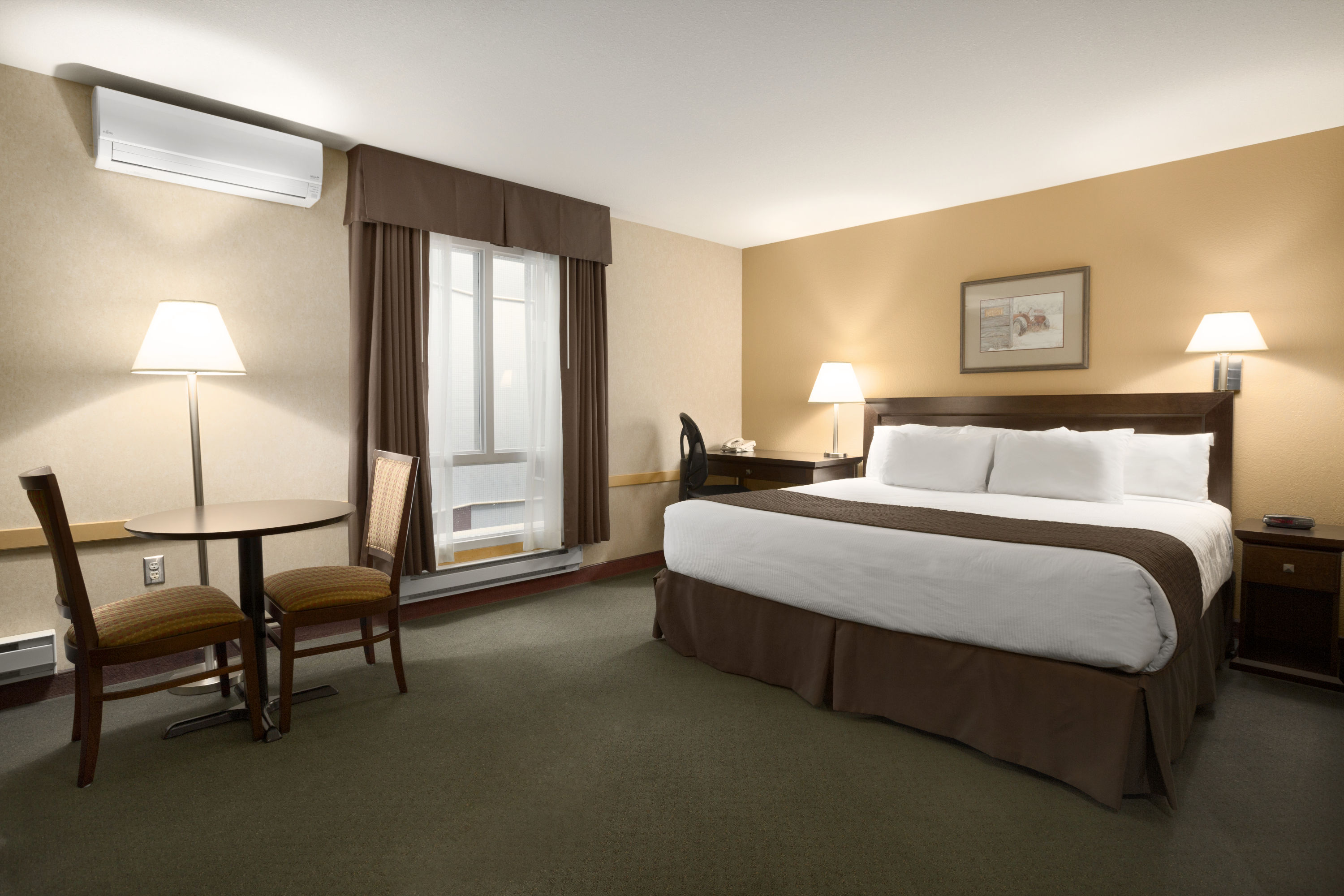 Guest room at the Days Inn by Wyndham Estevan in Estevan, Saskatchewan