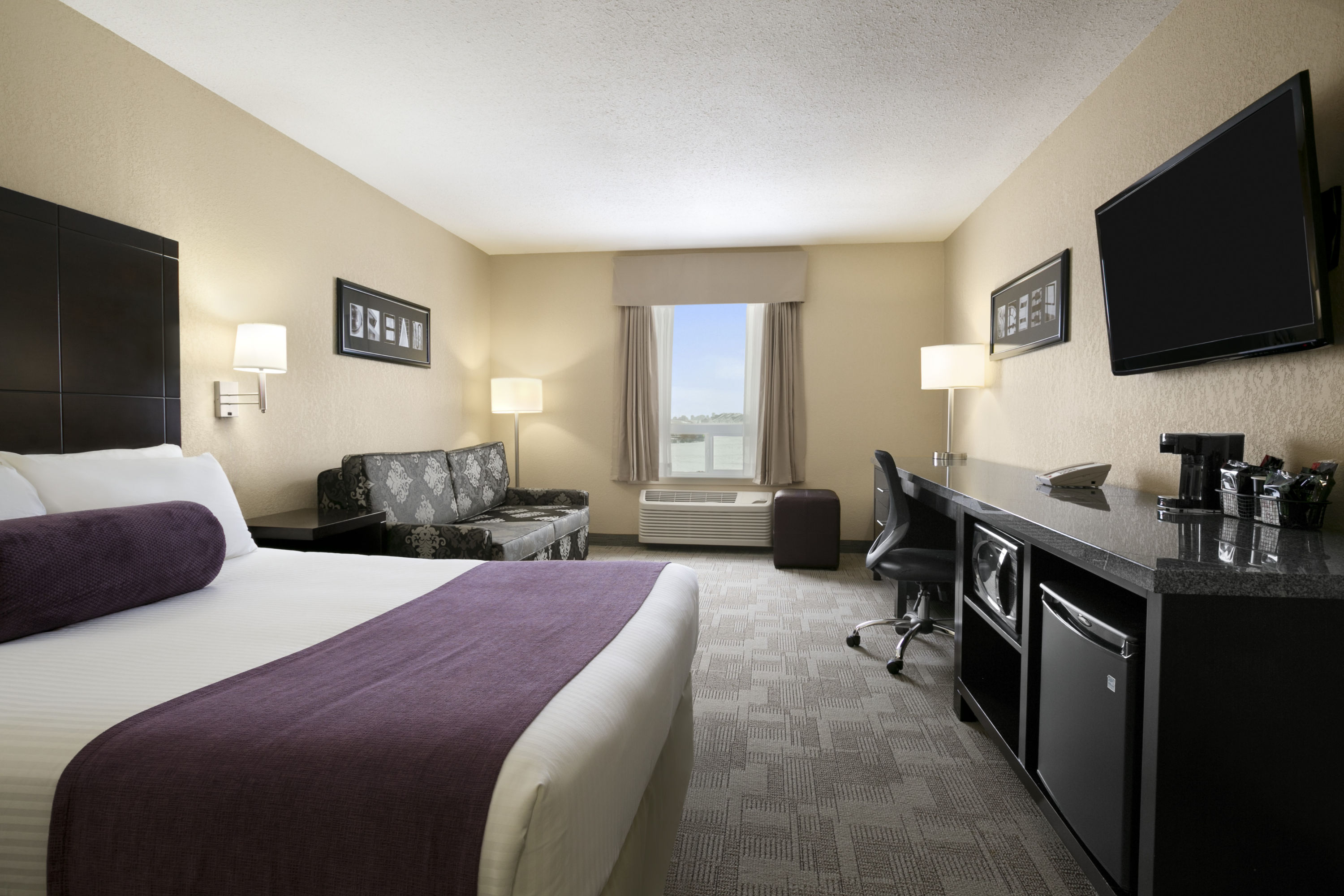 Guest room at the Days Inn by Wyndham Regina in Regina, Saskatchewan