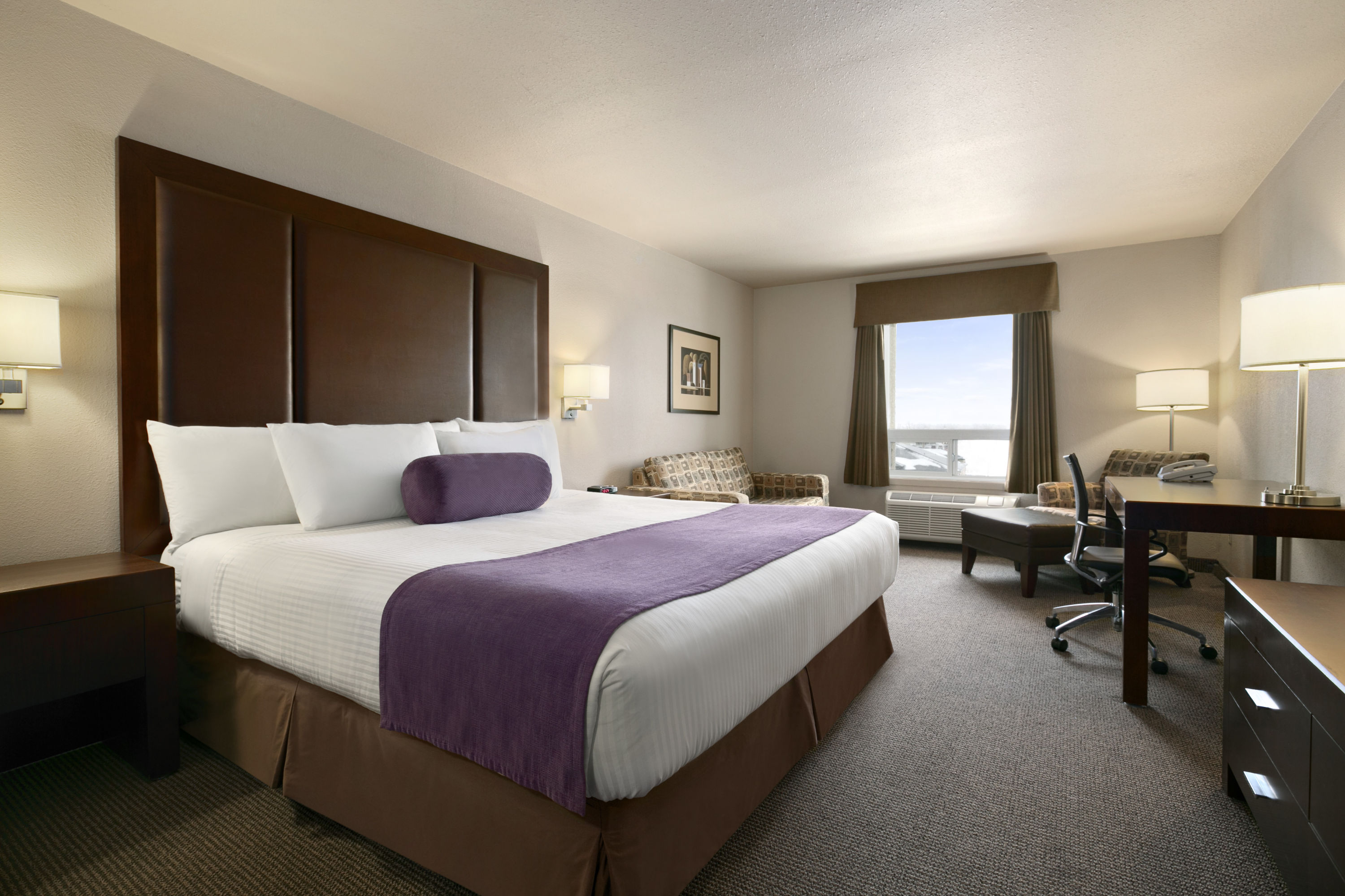 Guest room at the Days Inn by Wyndham Regina in Regina, Saskatchewan