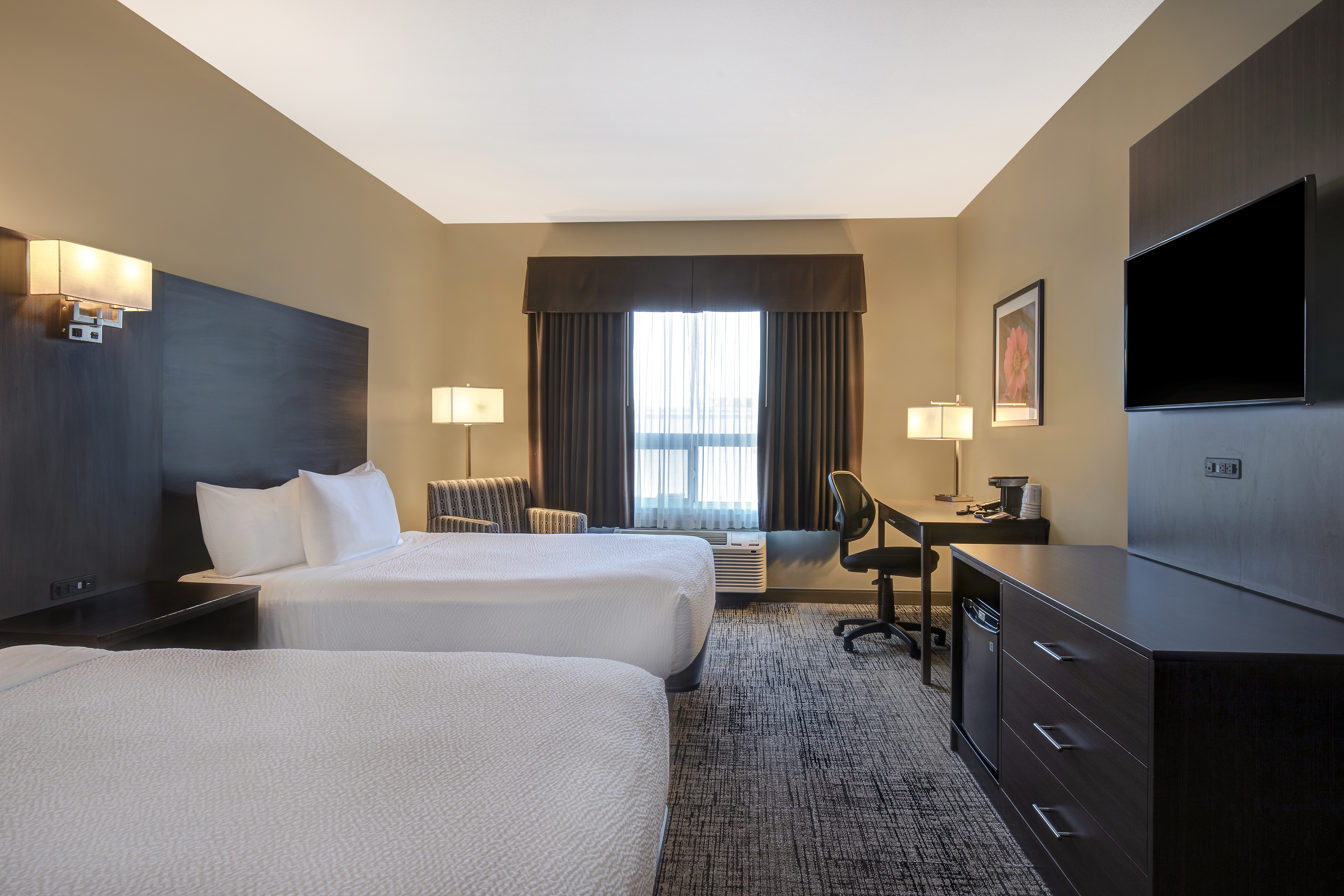 Guest room at the Days Inn & Suites by Wyndham Warman in Warman, Saskatchewan