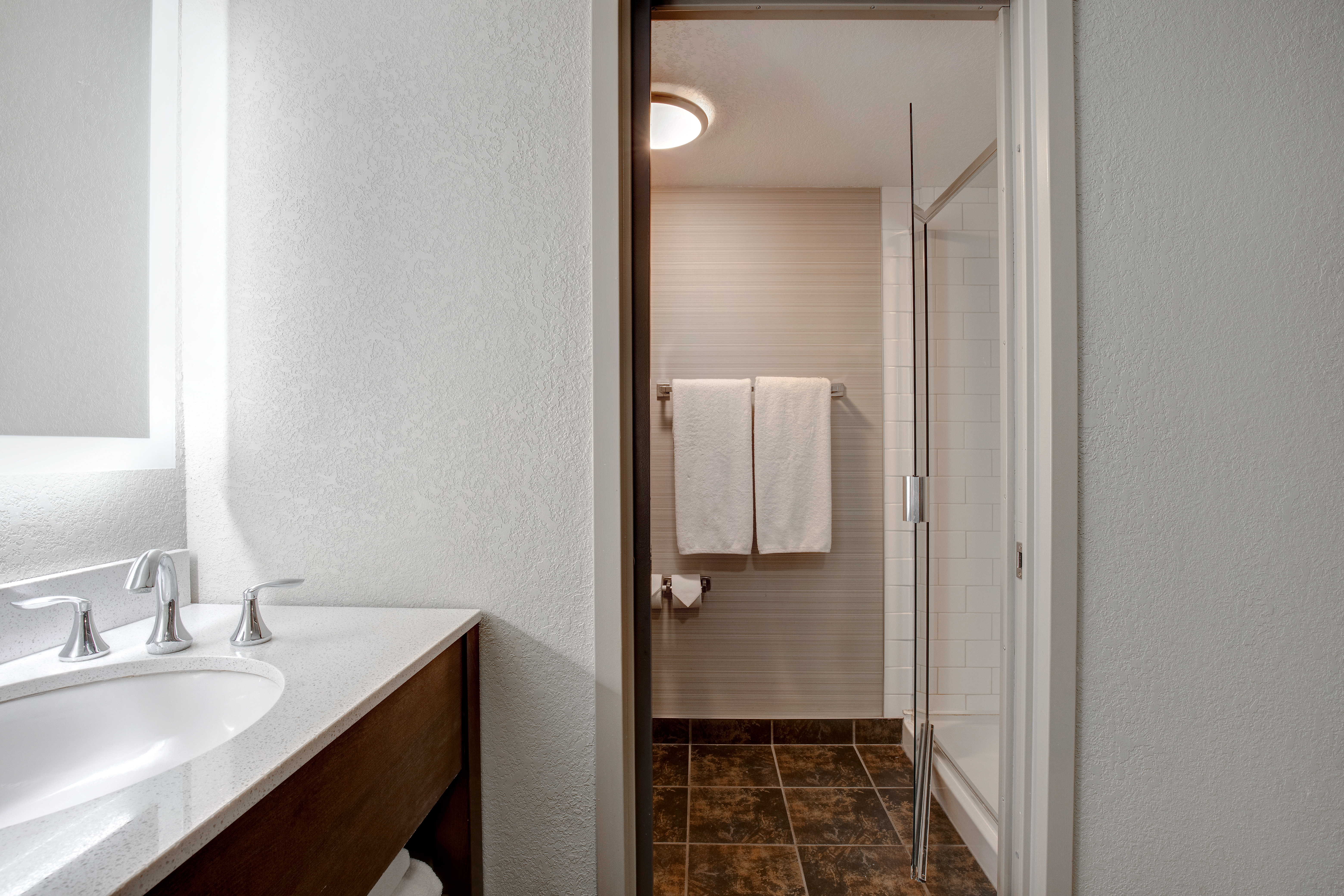 Guest room bath at the Days Inn & Suites by Wyndham Yorkton in Yorkton, Saskatchewan