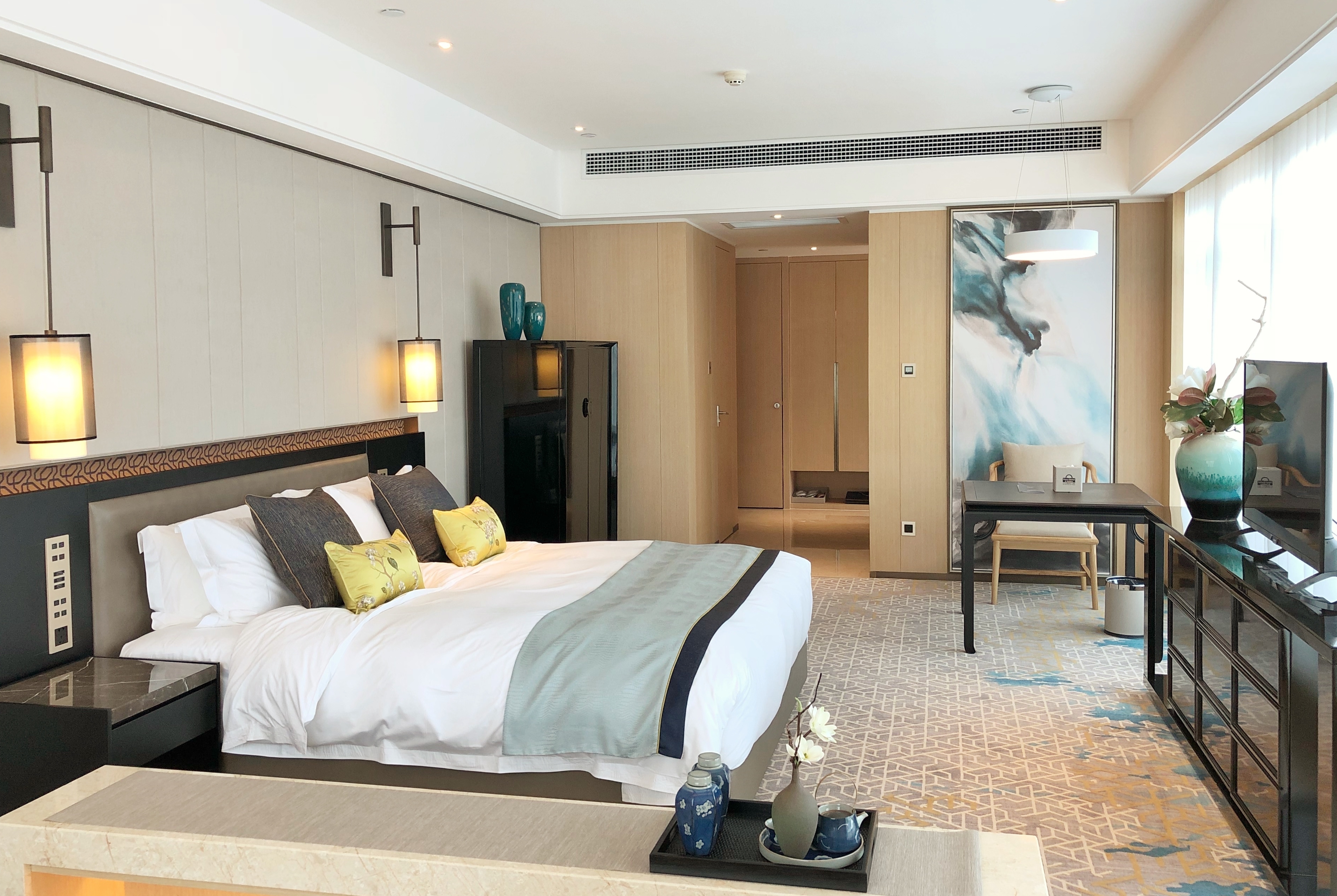 Guest room at the Days Hotel & Suites by Wyndham Zixin Changsha in Changsha, Other than US/Canada