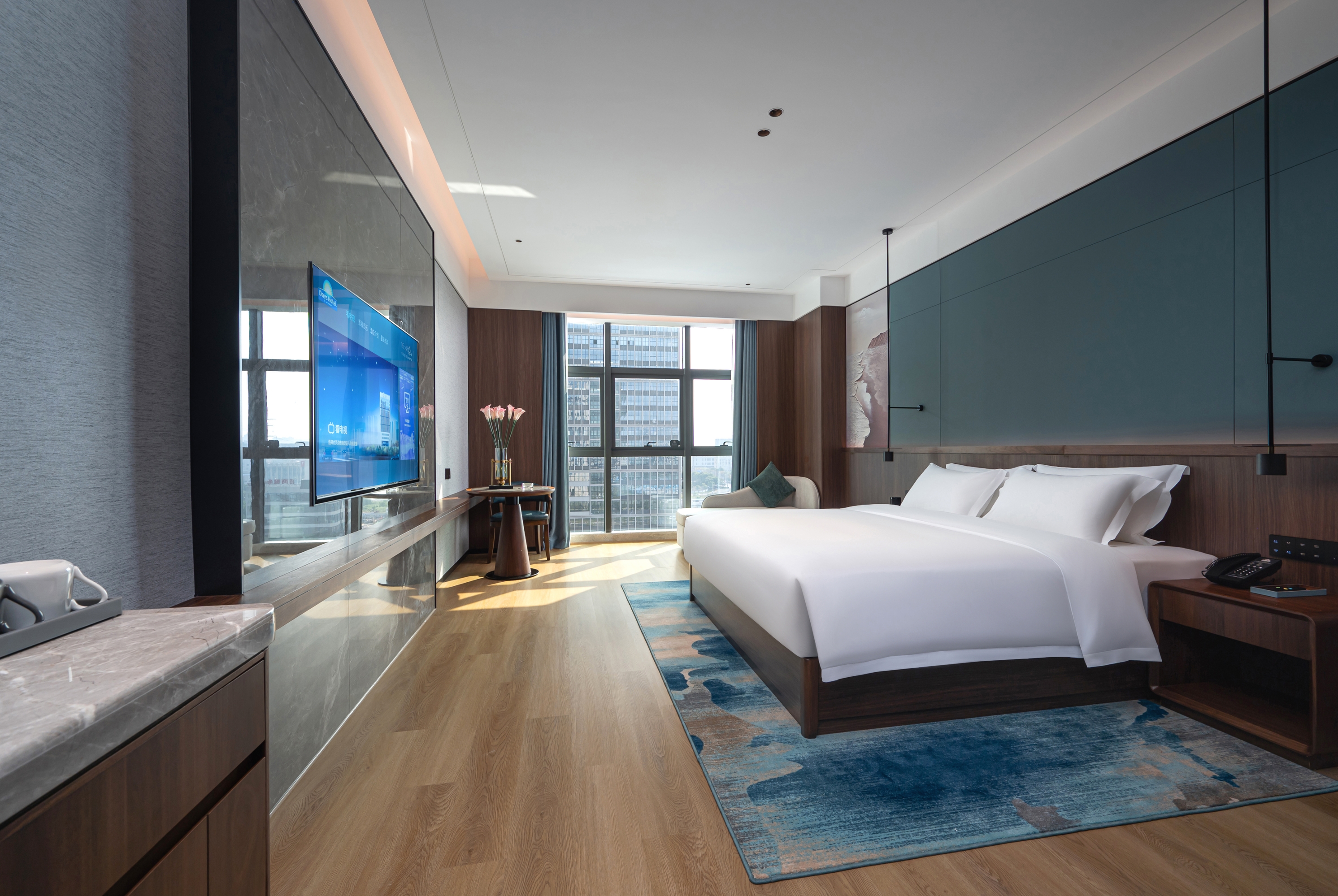 Guest room at the Days Hotel by Wyndham Changsha East in Changsha, Other than US/Canada