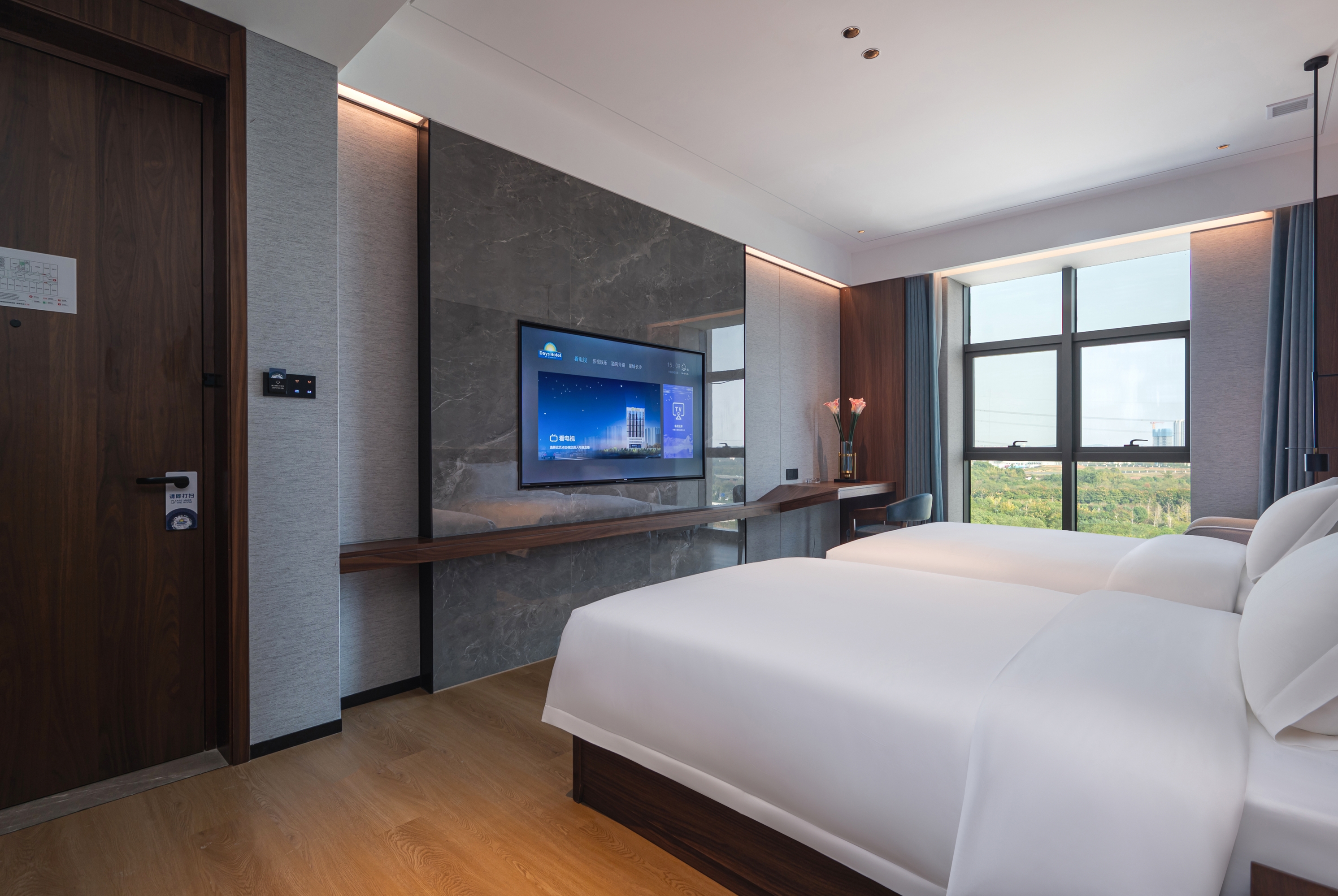 Guest room at the Days Hotel by Wyndham Changsha East in Changsha, Other than US/Canada
