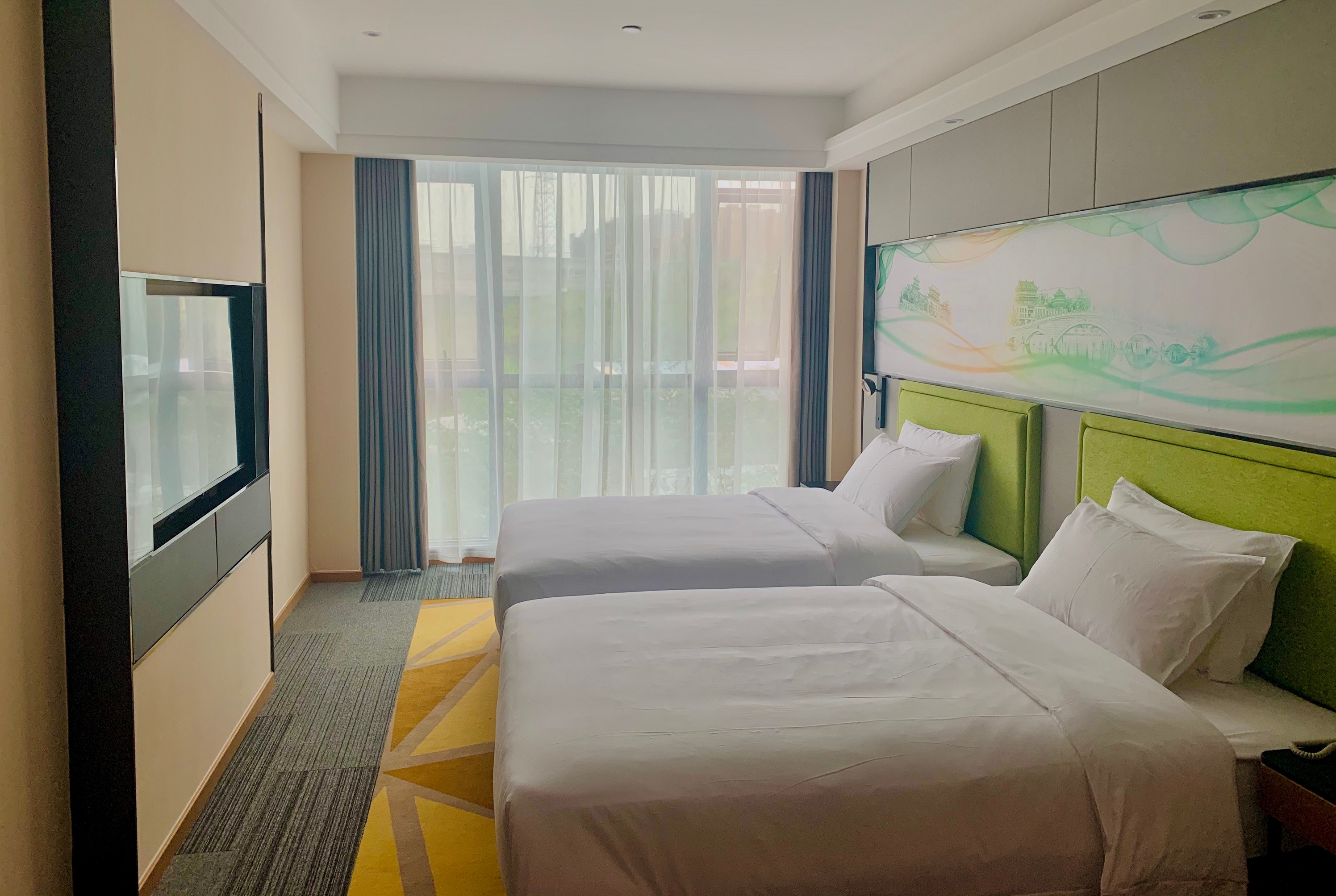 Guest room at the Days Hotel by Wyndham Bishan Chongqing in Chongqing, Other than US/Canada