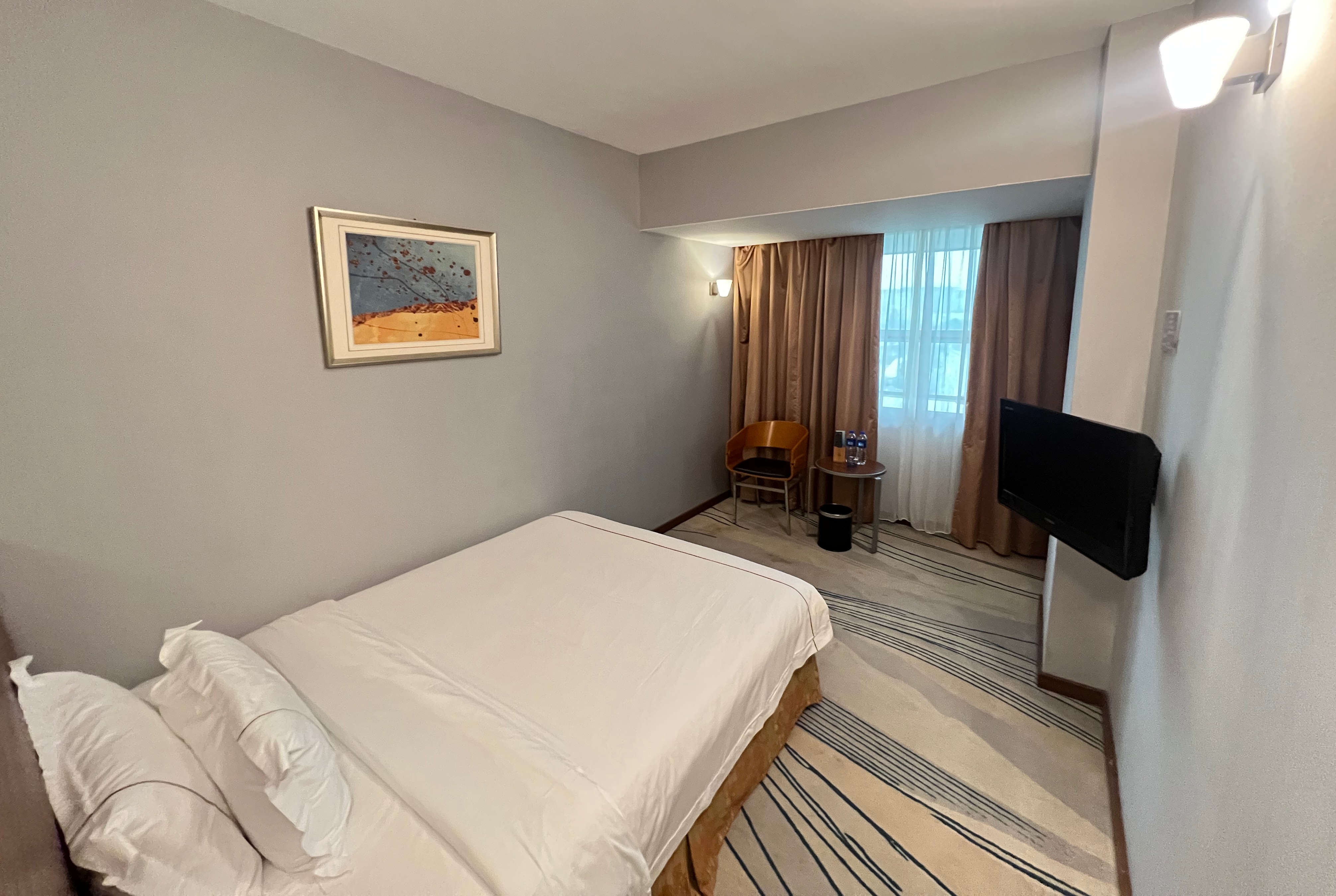Guest room at the Days Inn by Wyndham Guangzhou in Guangzhou, Other than US/Canada