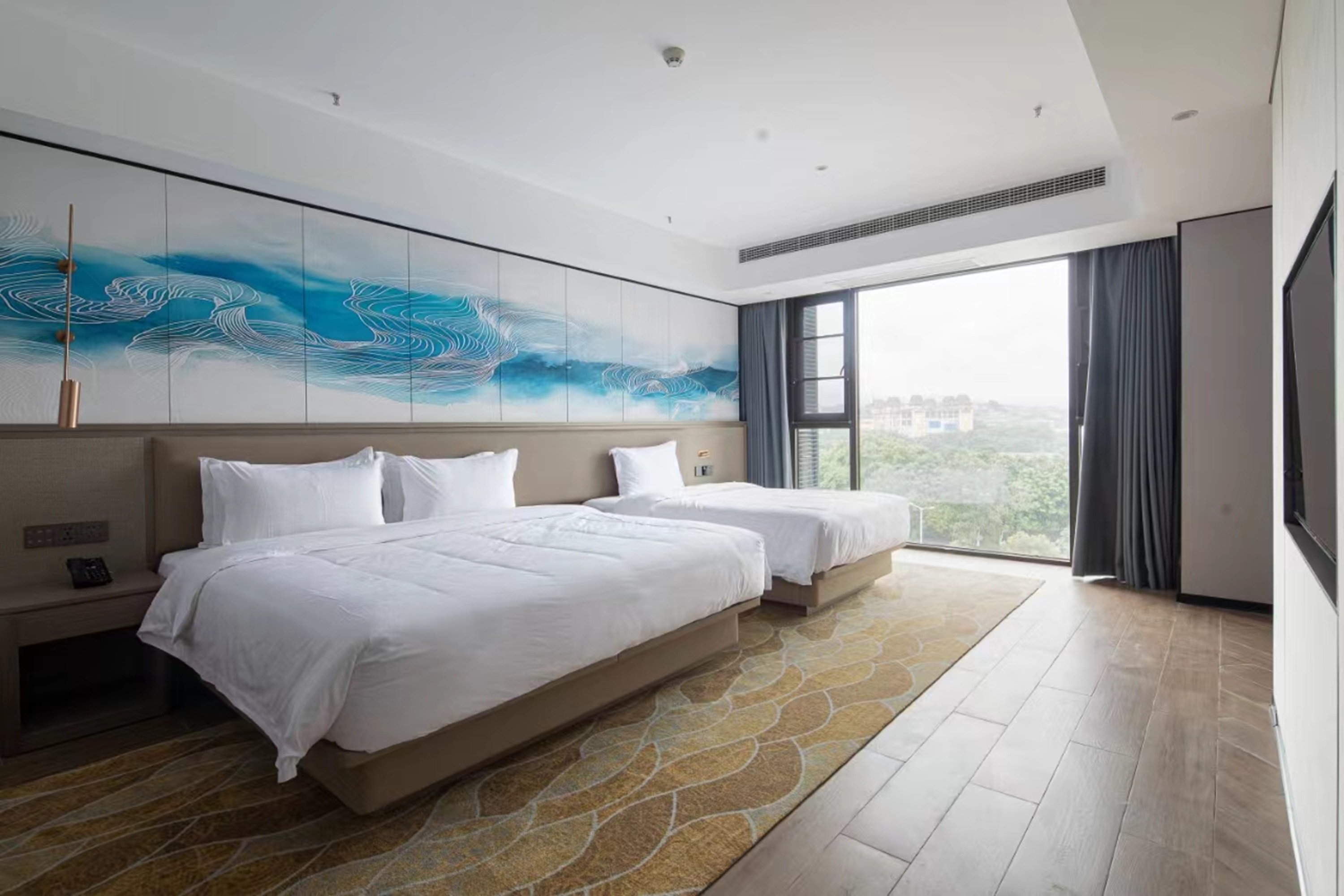Guest room at the Days Hotel by Wyndham Xishuangbanna Jinghong in Jinghong City, Other than US/Canada