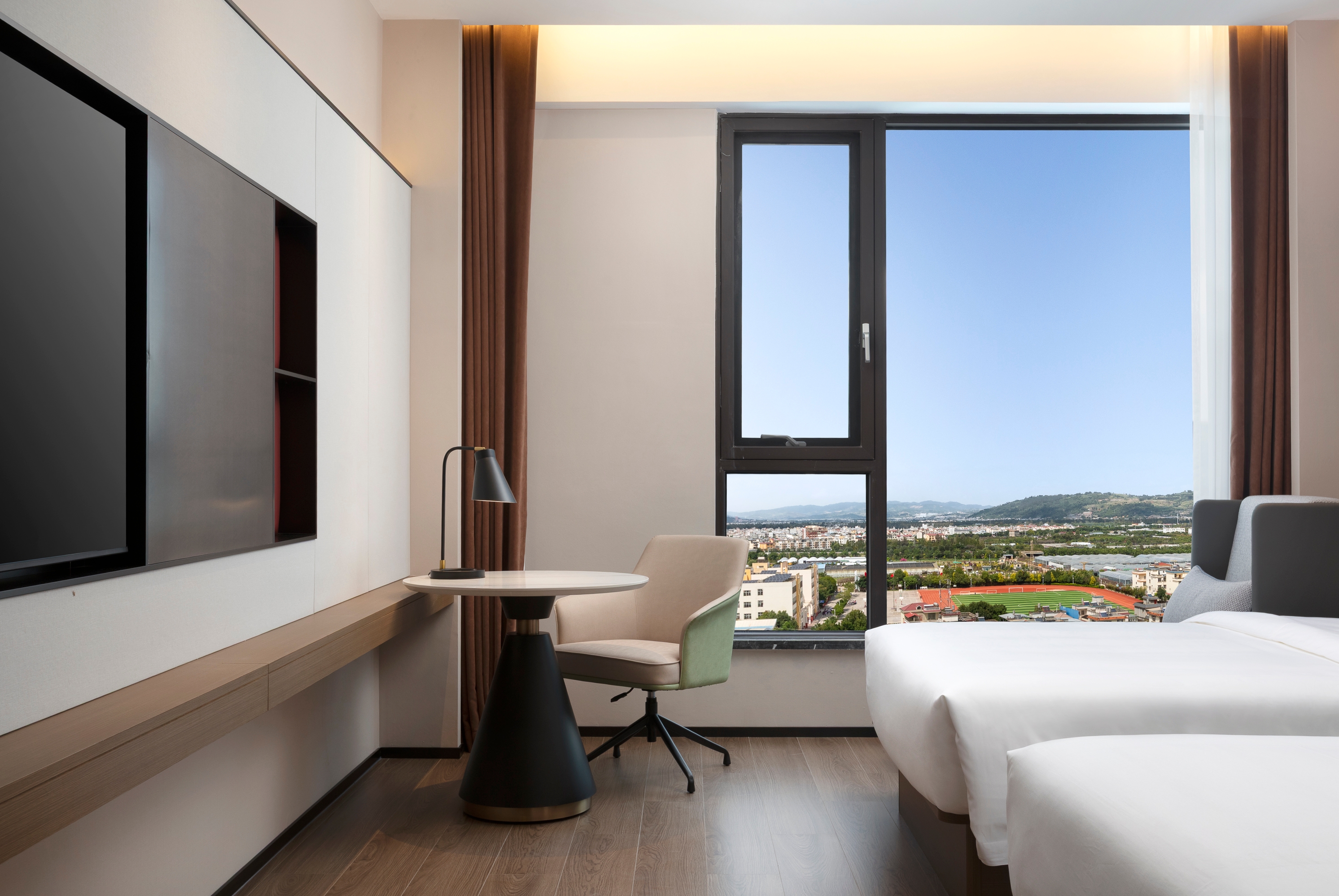 Guest room at the Days Hotel by Wyndham Kunming Yiliang in Kunming, Other than US/Canada