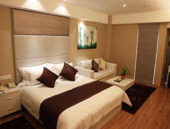 Guest room at the Days Inn by Wyndham Qi Xiu in Nantong, Other than US/Canada
