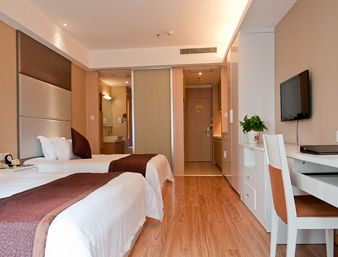 Guest room at the Days Inn by Wyndham Qi Xiu in Nantong, Other than US/Canada