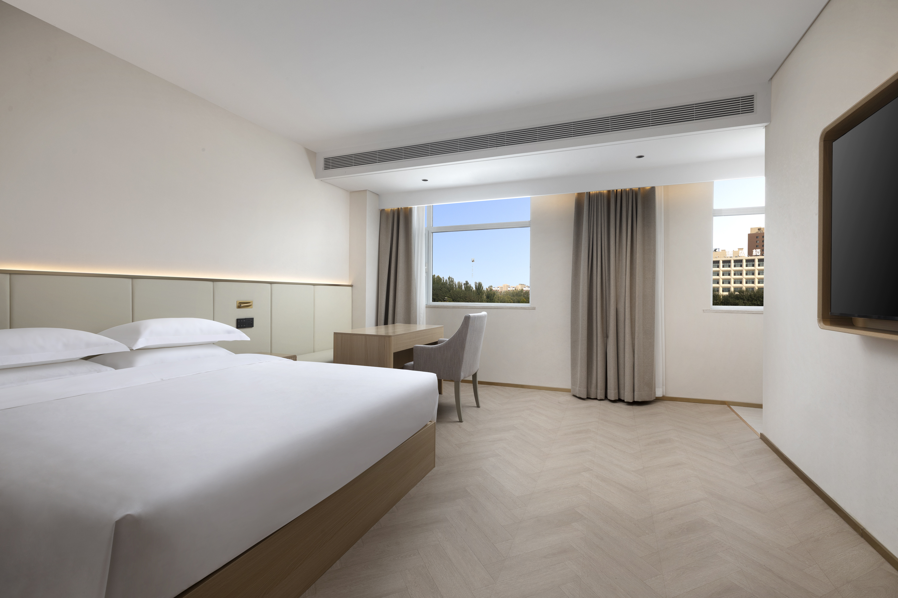 Guest room at the Days Inn by Wyndham Yinchuan East Jiefang Road in Yinchuan, Other than US/Canada