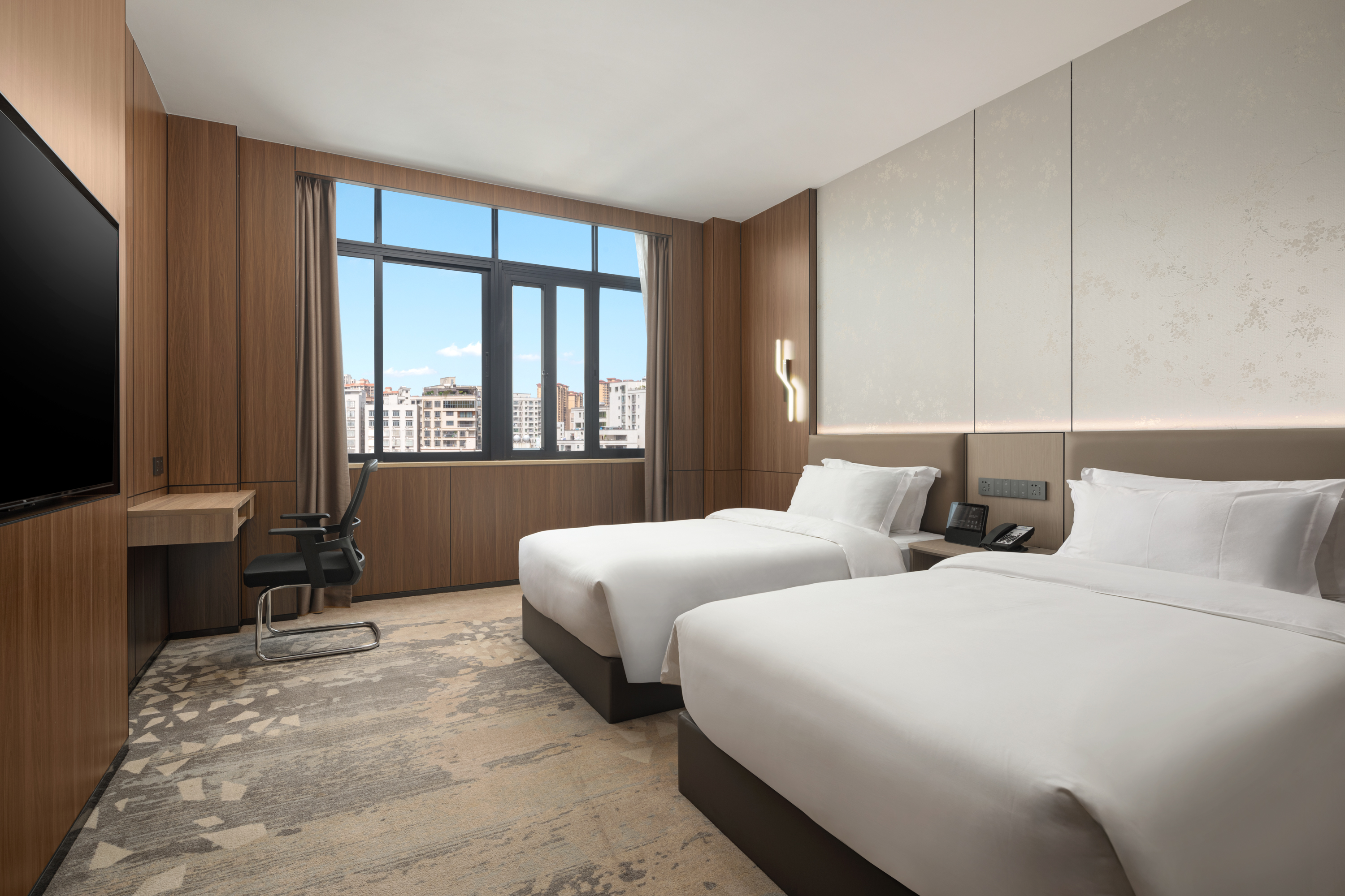 Guest room at the Days Inn by Wyndham Zhanjiang Economic Development Zone in Zhanjiang, Other than US/Canada