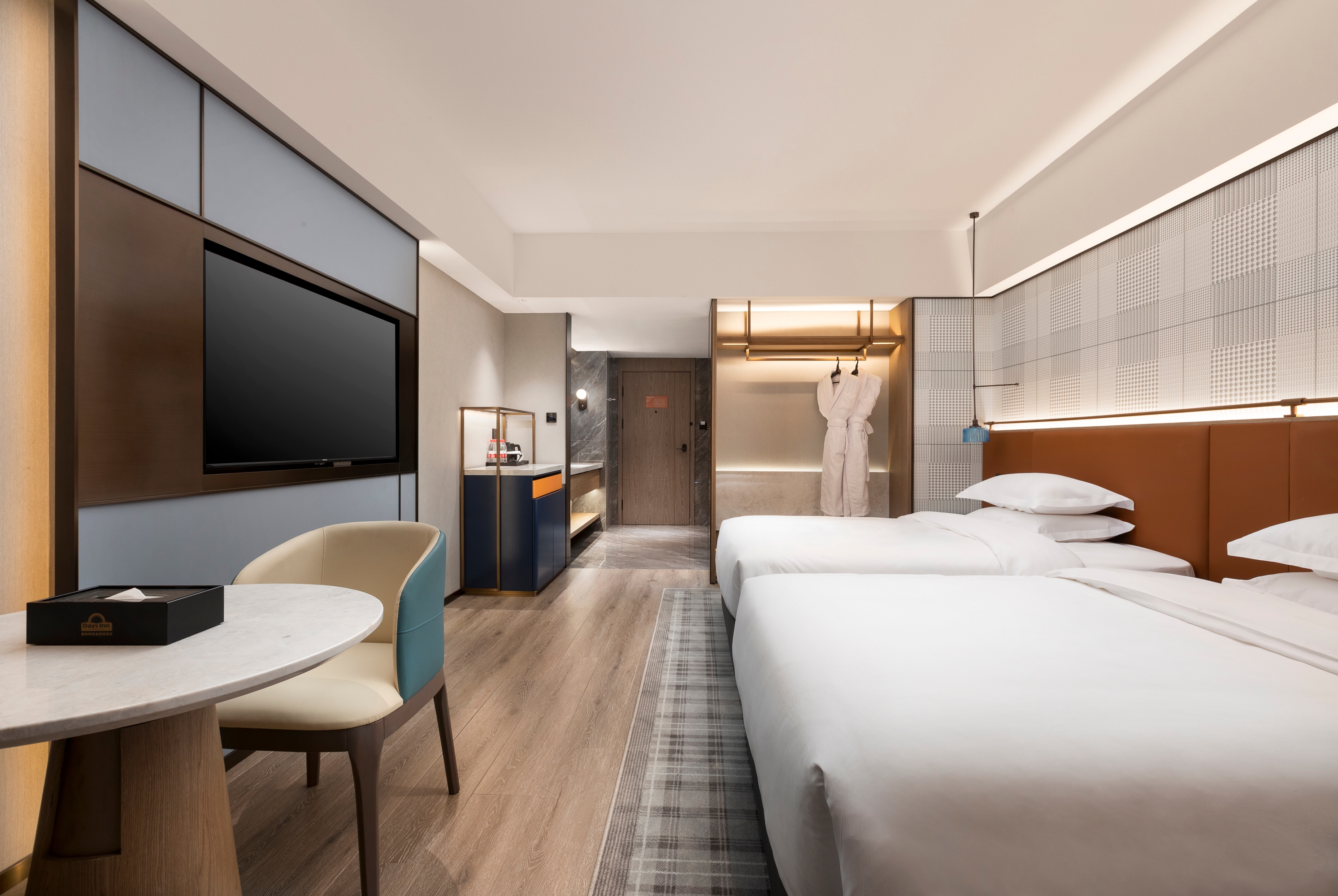 Guest room at the Days Inn by Wyndham Zhengzhou Xinzheng Airport in Zhengzhou, Other than US/Canada