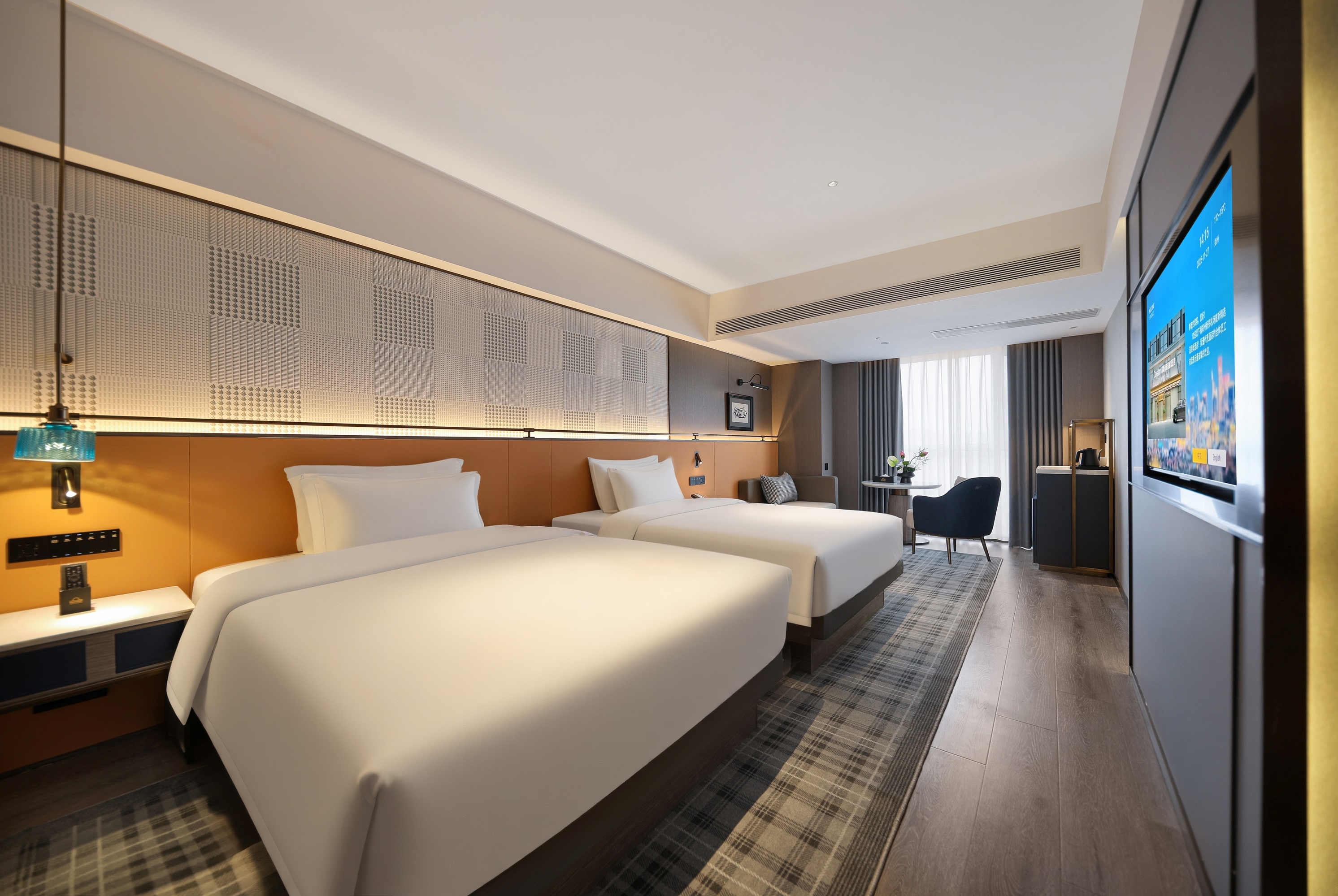 Guest room at the Days Inn by Wyndham Zhengzhou Xinzheng Airport in Zhengzhou, Other than US/Canada