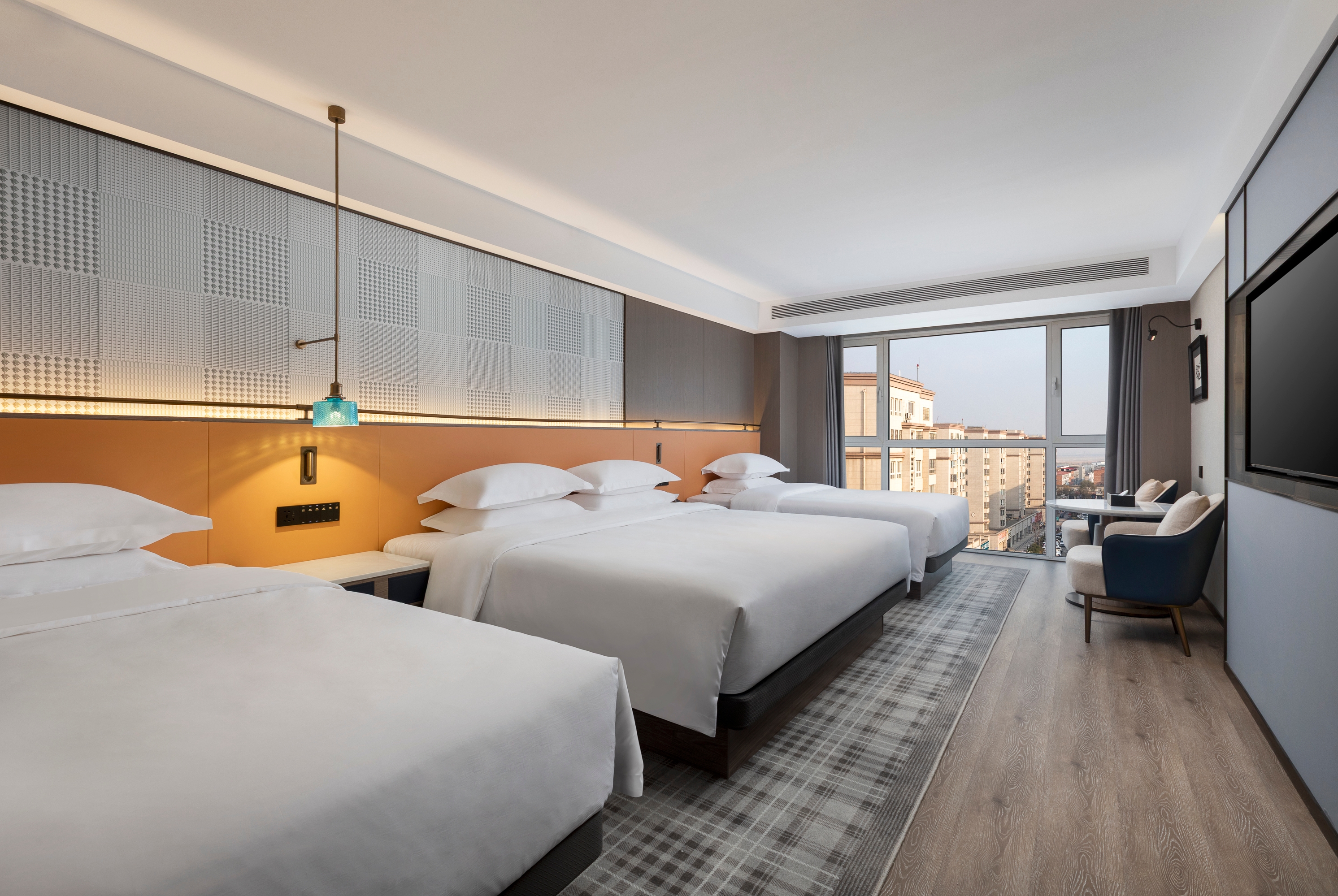 Guest room at the Days Inn by Wyndham Zhengzhou Xinzheng Airport in Zhengzhou, Other than US/Canada