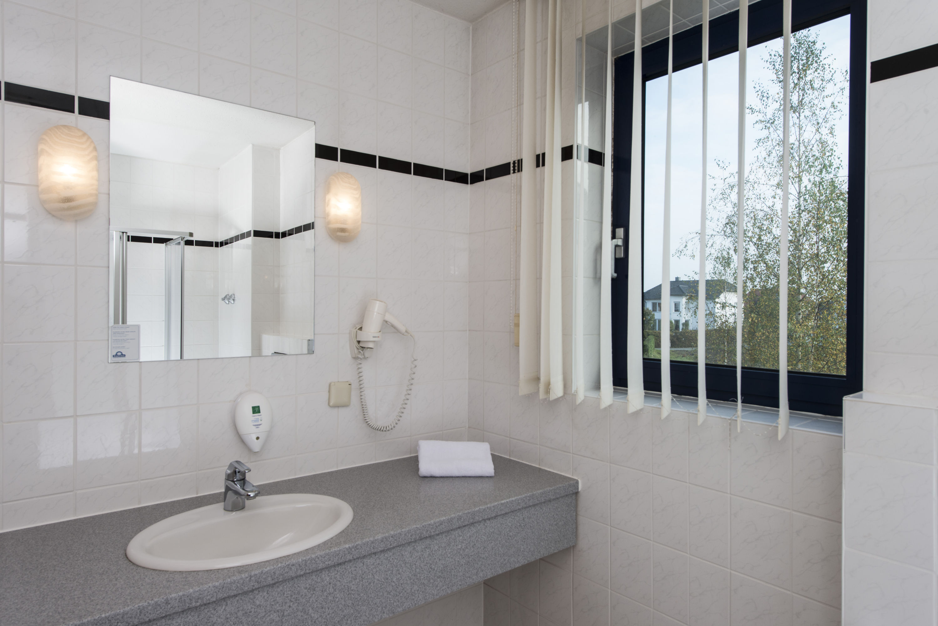 Guest room at the Days Inn by Wyndham Leipzig Messe in Leipzig, Other than US/Canada