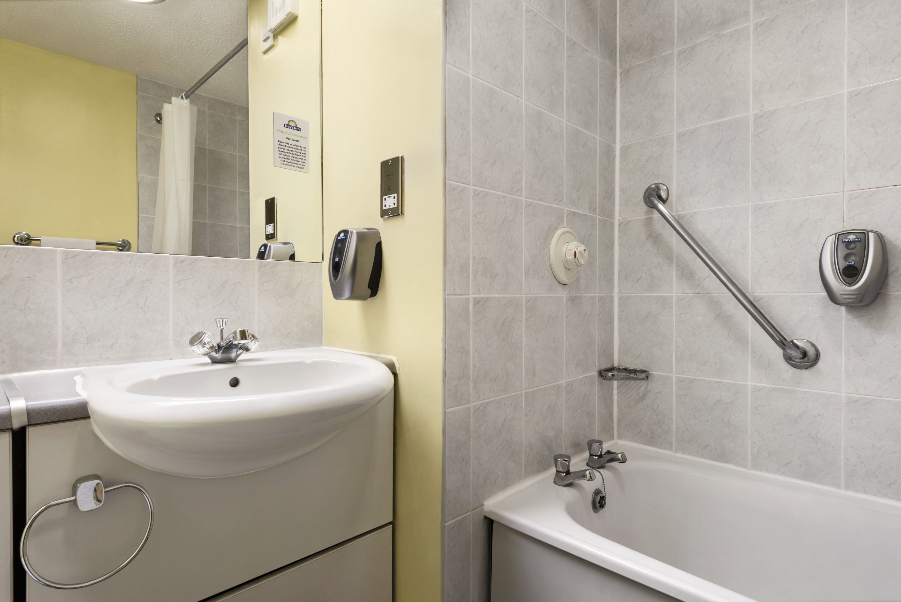 Guest room bath at the Days Inn by Wyndham Watford Gap in Northampton, Other than US/Canada