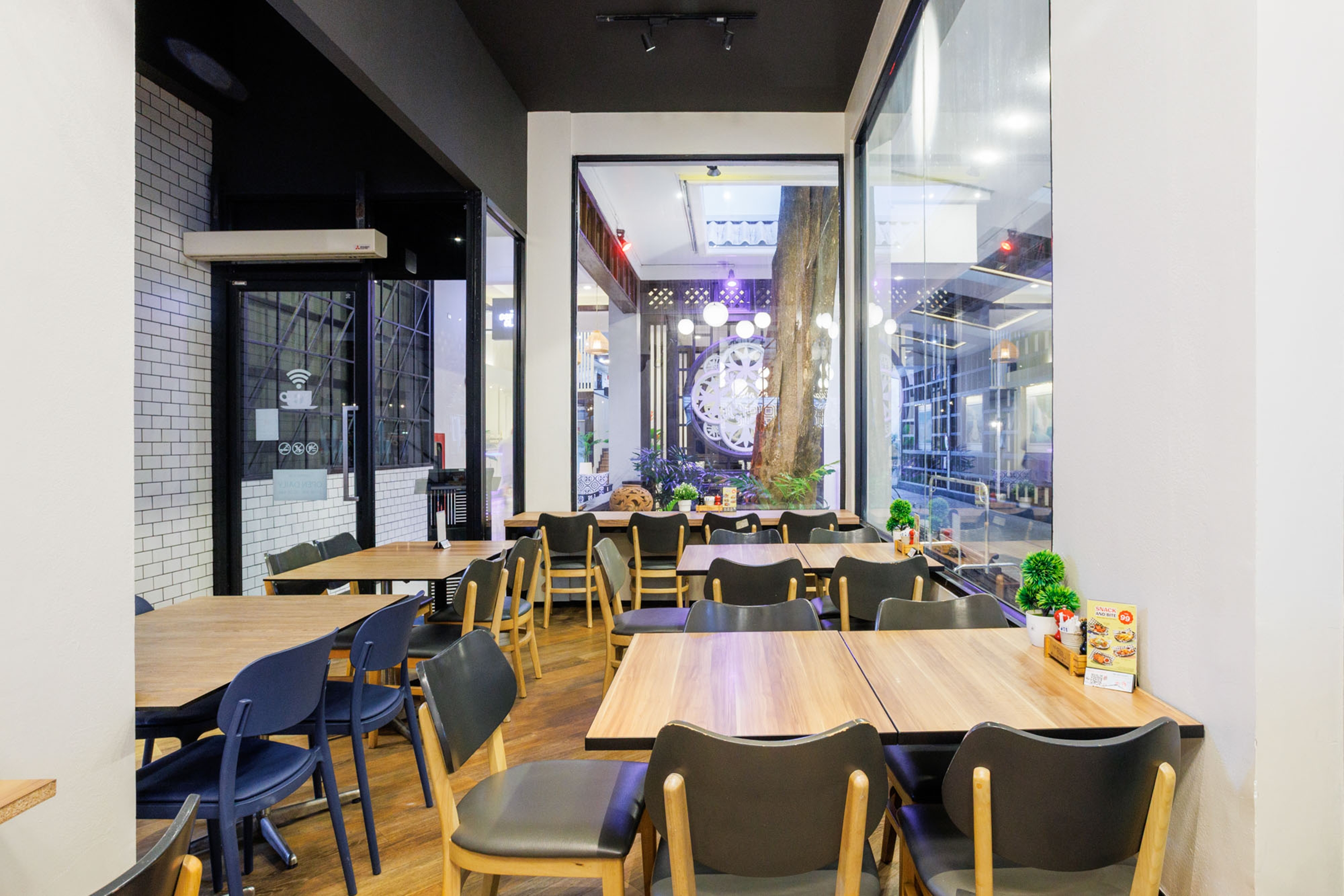 Days Inn by Wyndham Patong Beach Phuket restaurant breakfast area with seating in Phuket, Other than US/Canada