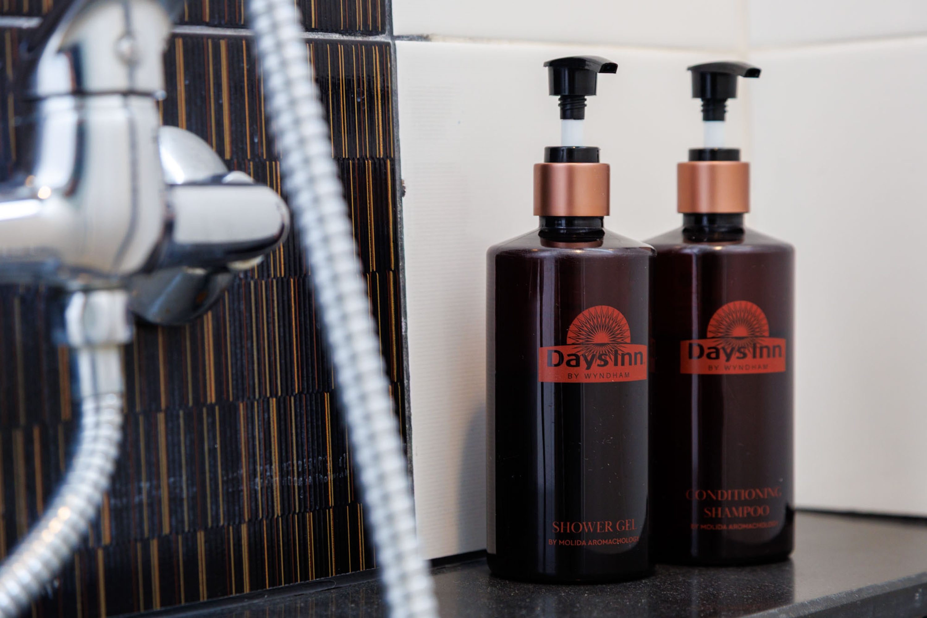 Guest room bath at the Days Inn by Wyndham Patong Beach Phuket in Phuket, Other than US/Canada