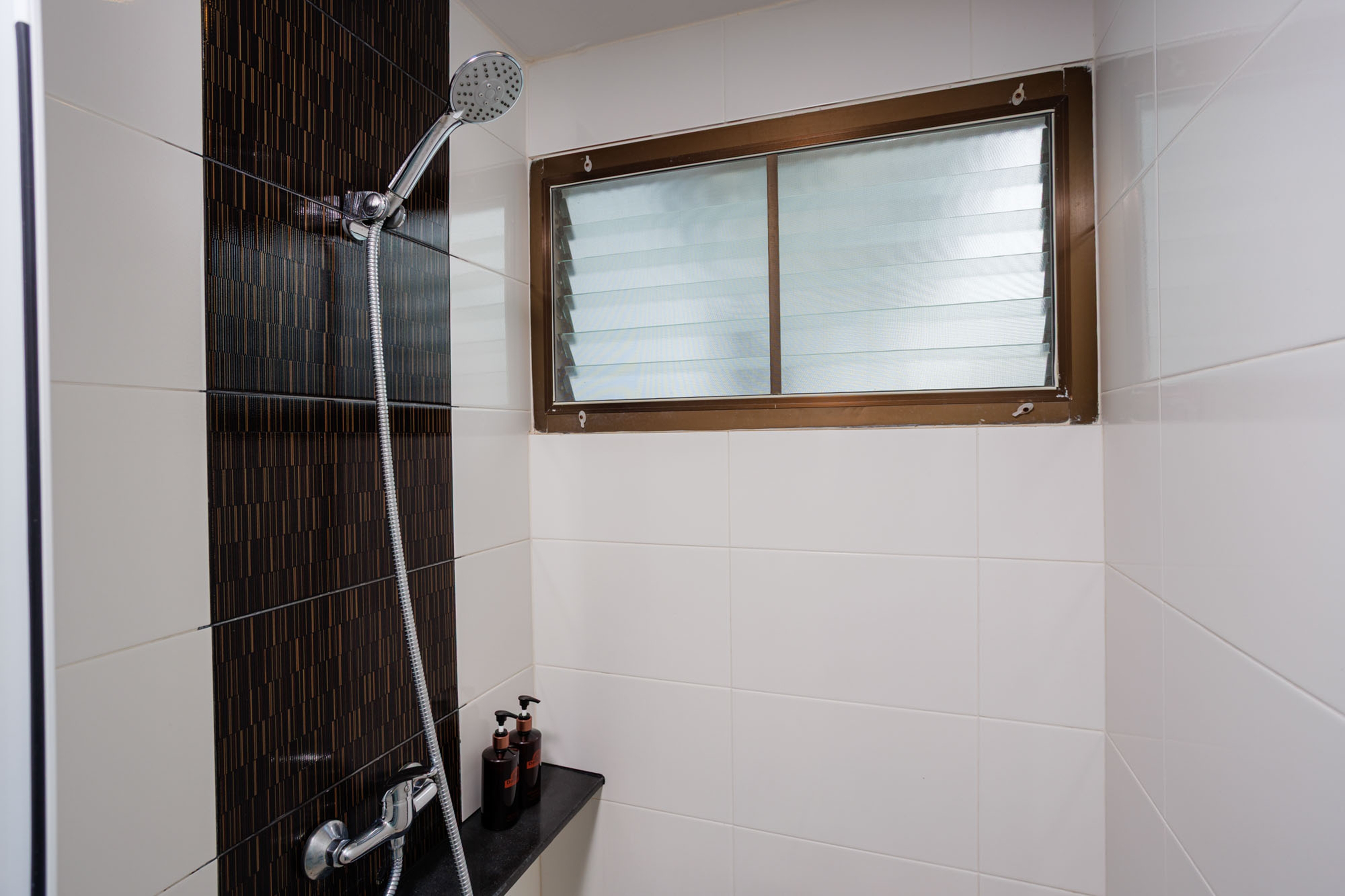 Guest room bath at the Days Inn by Wyndham Patong Beach Phuket in Phuket, Other than US/Canada
