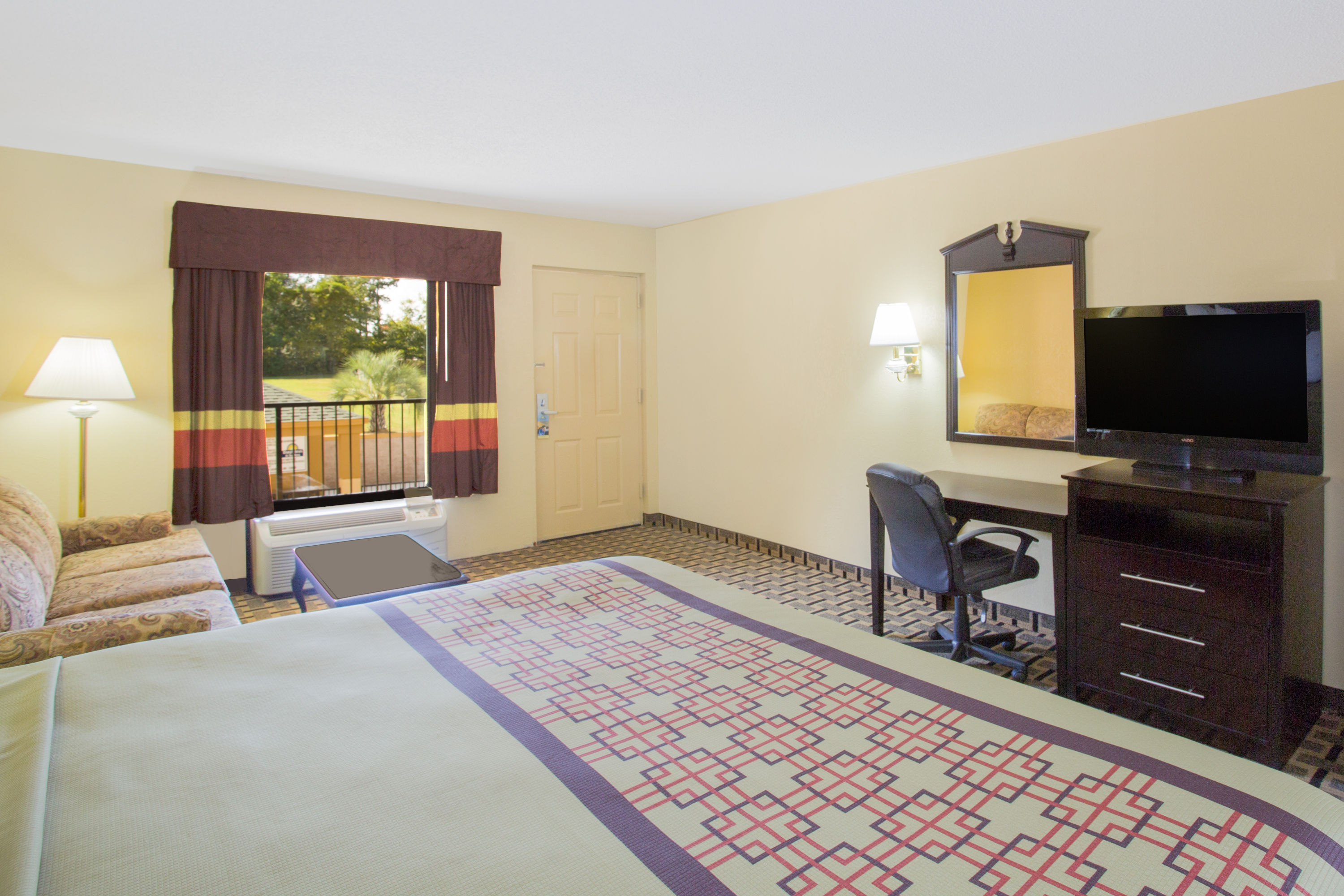 Guest room at the Days Inn by Wyndham Andalusia in Andalusia, Alabama