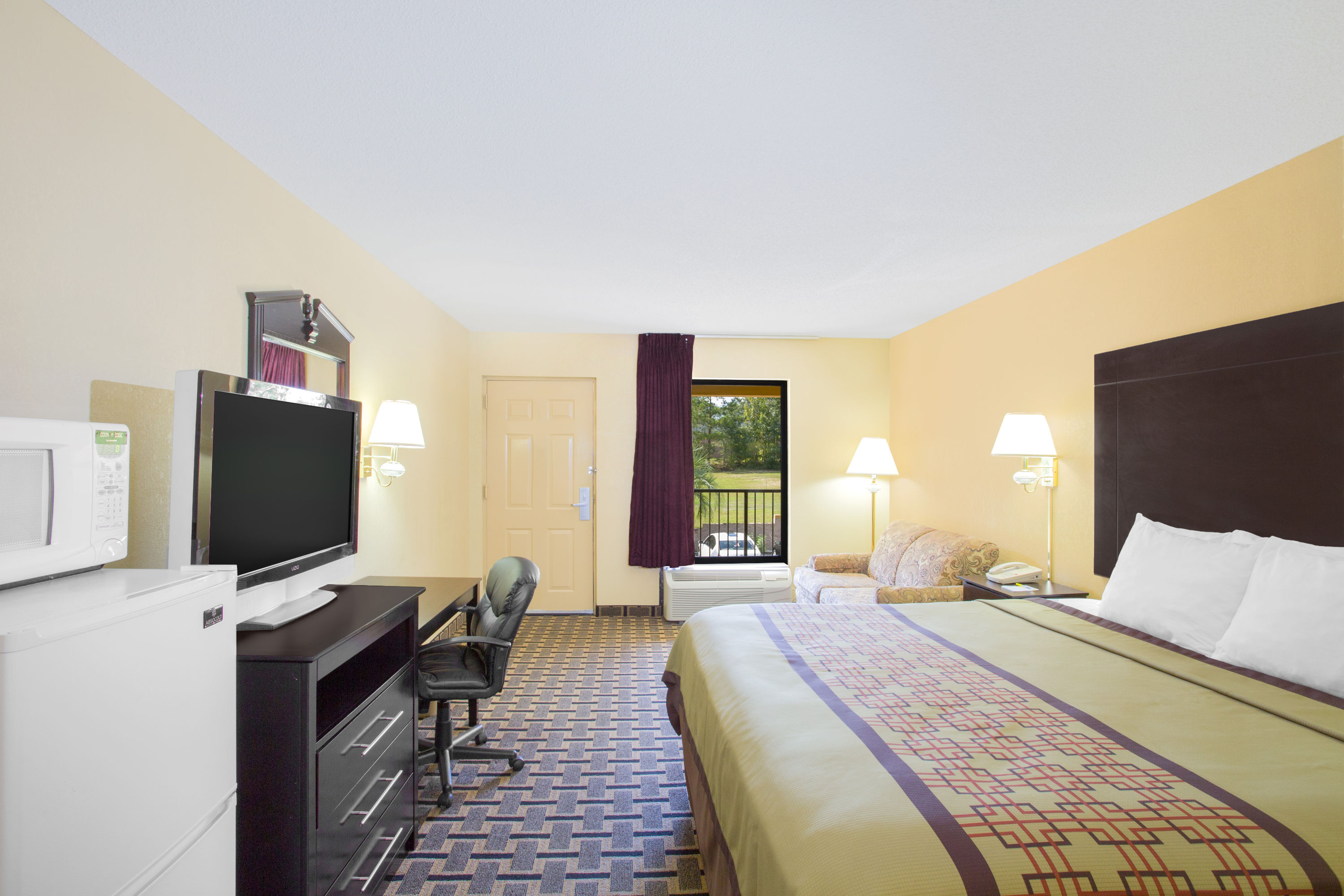 Guest room at the Days Inn by Wyndham Andalusia in Andalusia, Alabama
