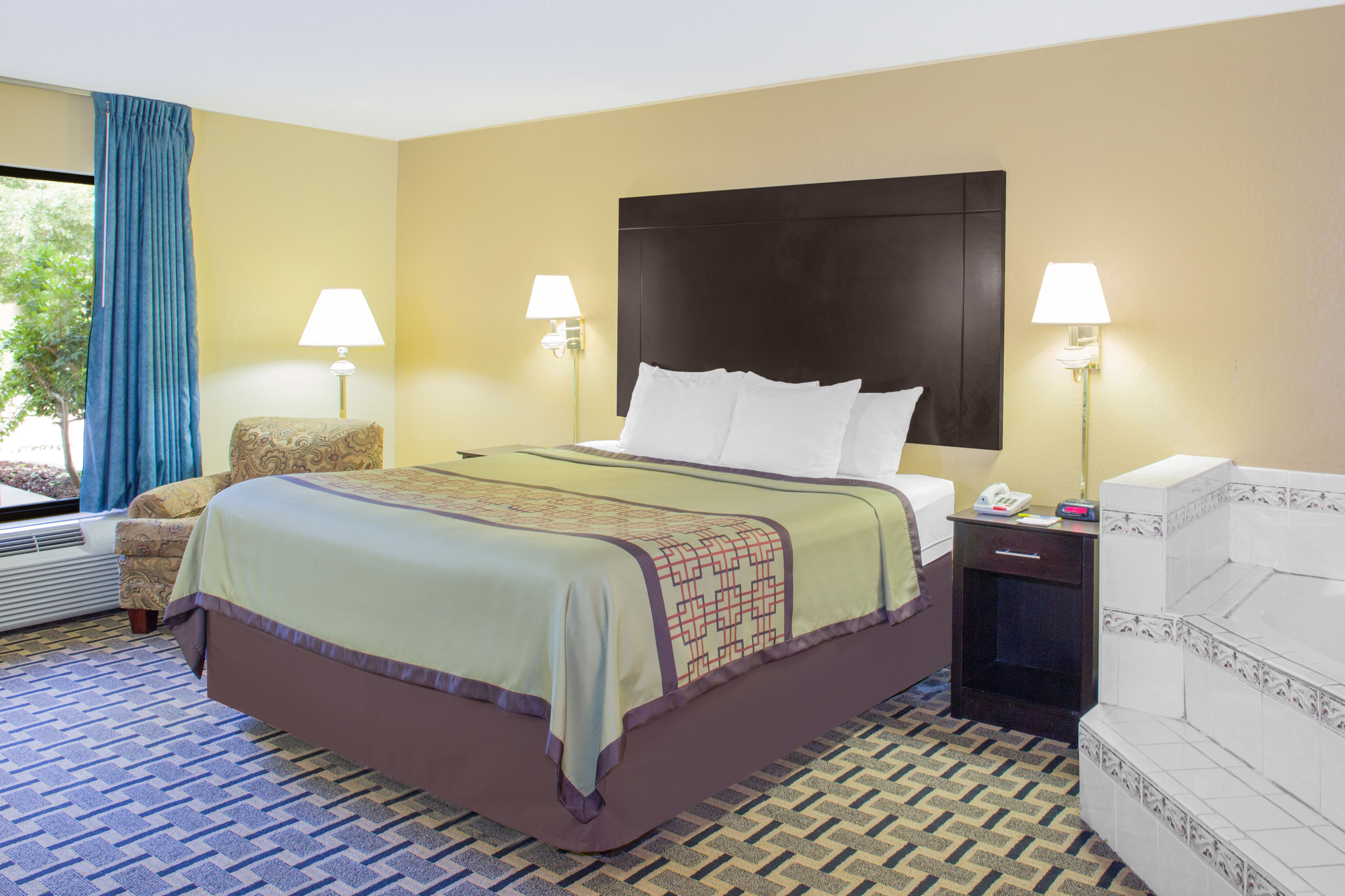 Guest room at the Days Inn by Wyndham Andalusia in Andalusia, Alabama