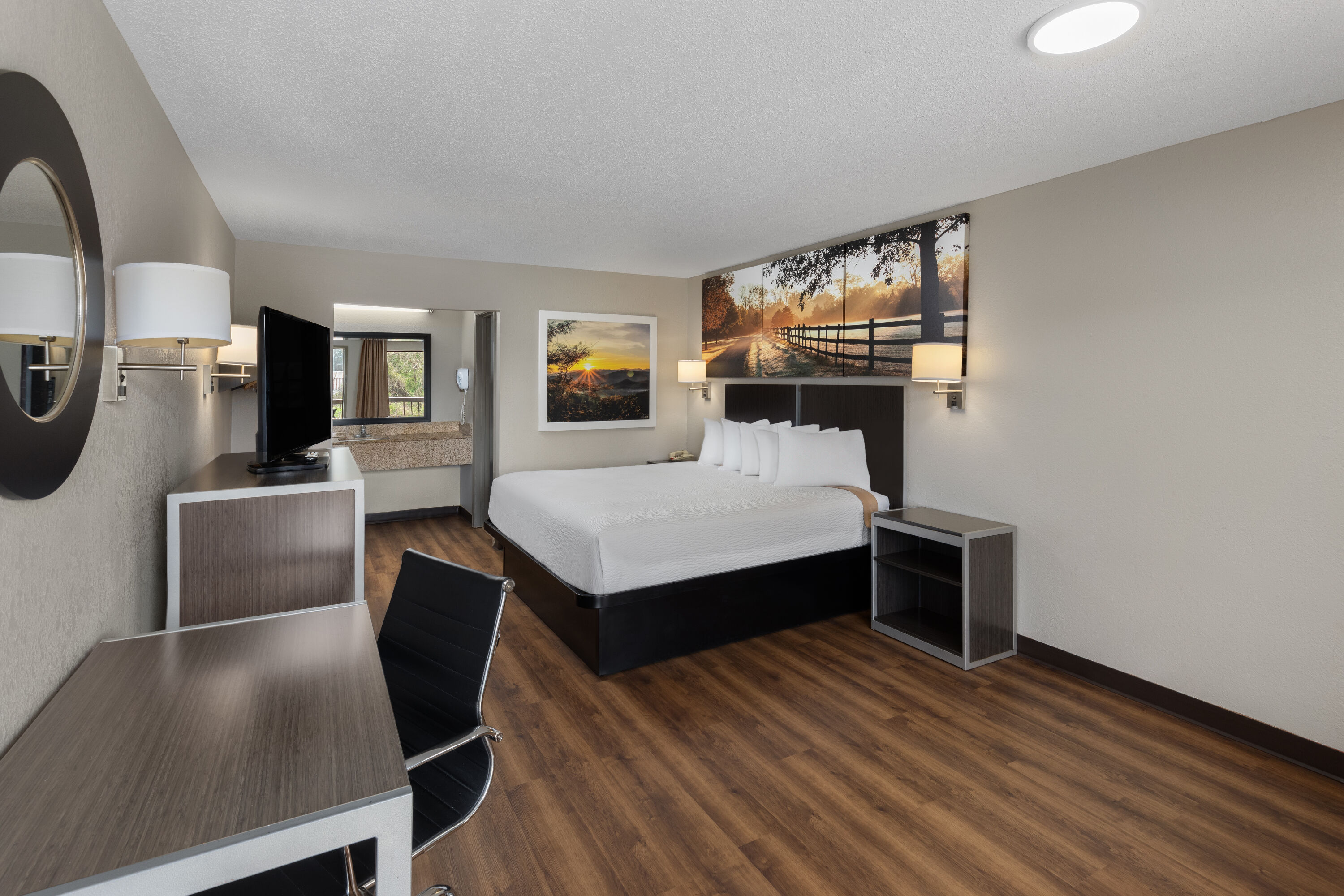 King bed guest room at the Days Inn by Wyndham Childersburg/Sylacauga in Childersburg, Alabama