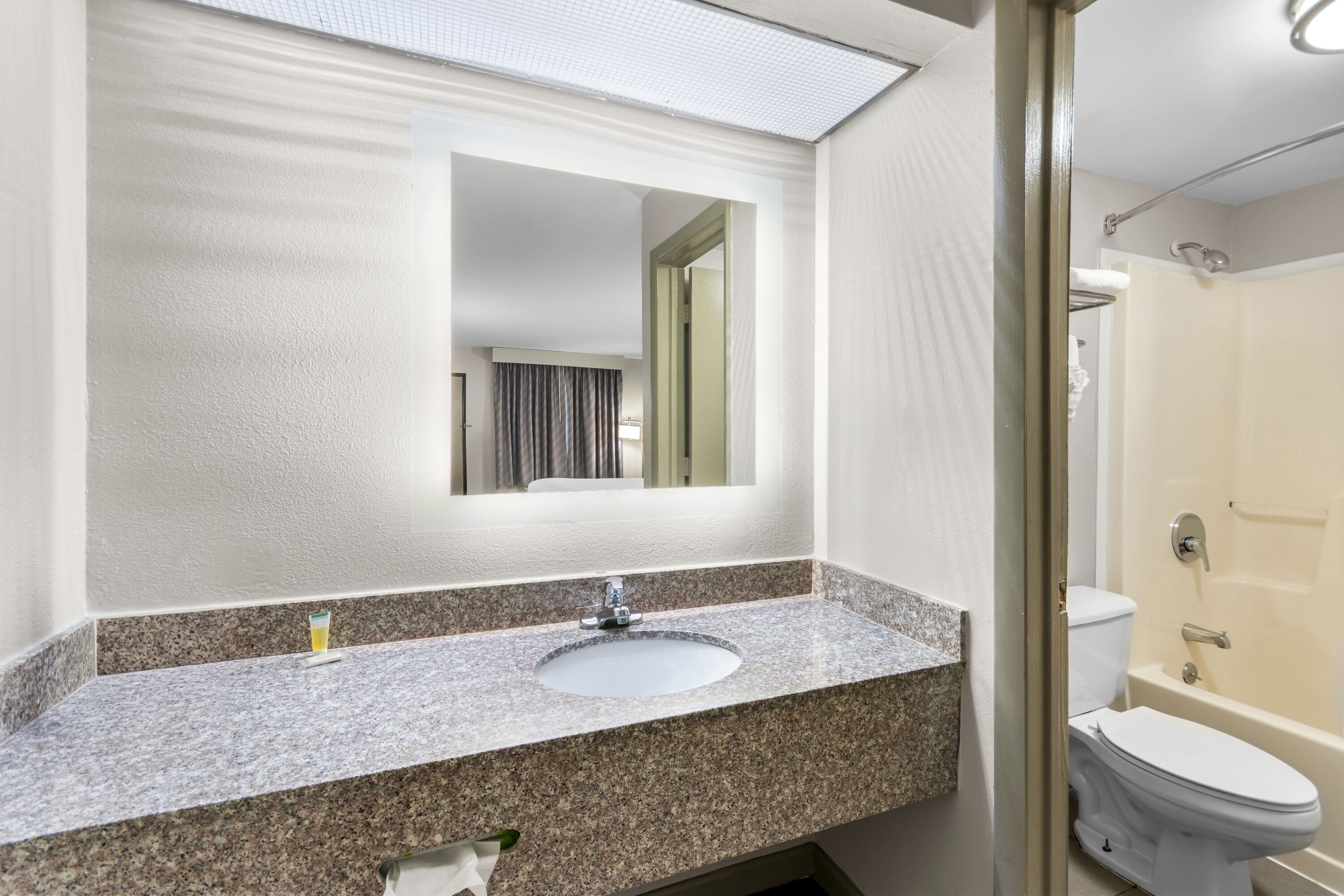 Guest room bath at the Days Inn by Wyndham Enterprise in Enterprise, Alabama