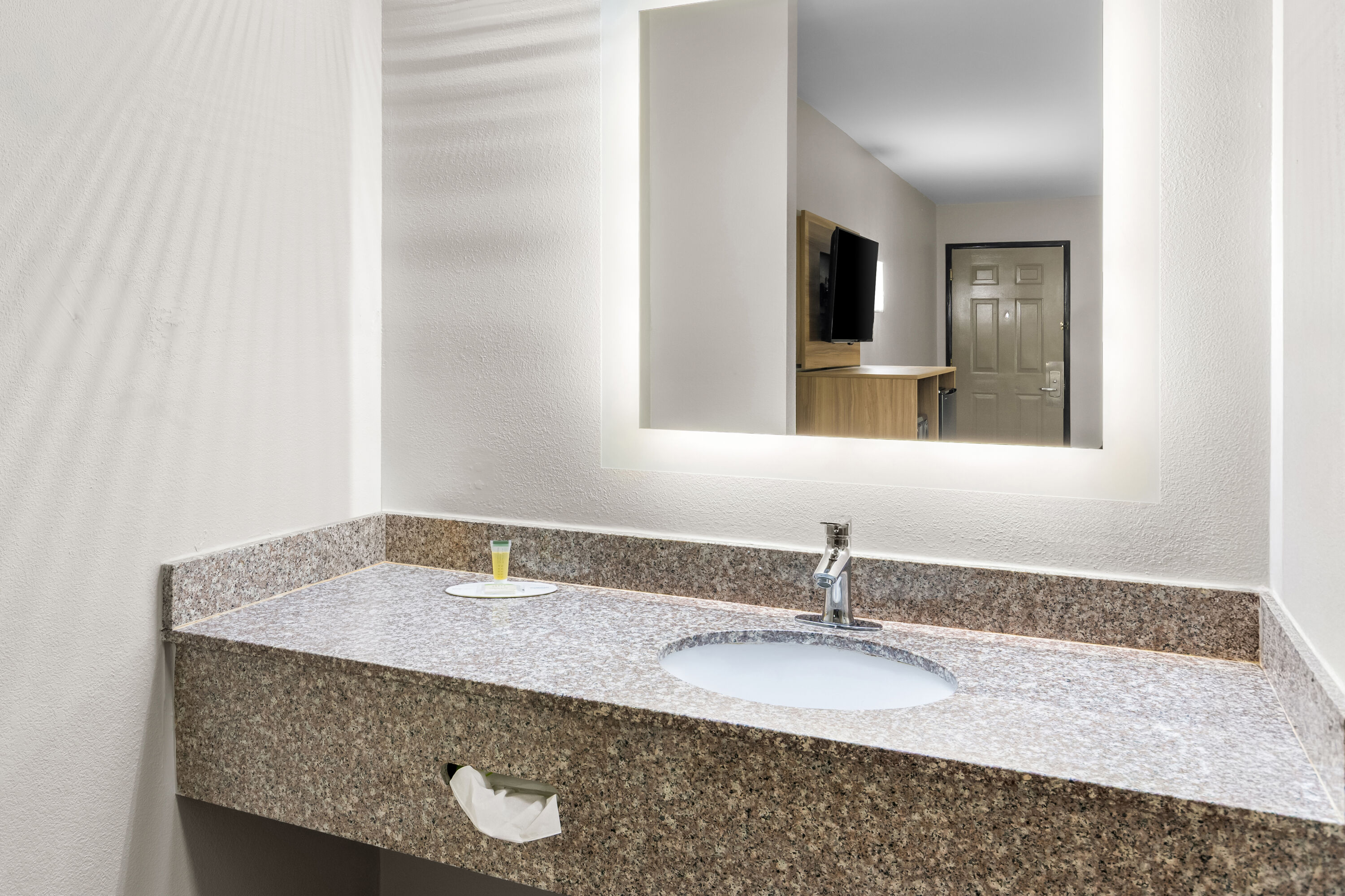 Guest room bath at the Days Inn by Wyndham Enterprise in Enterprise, Alabama