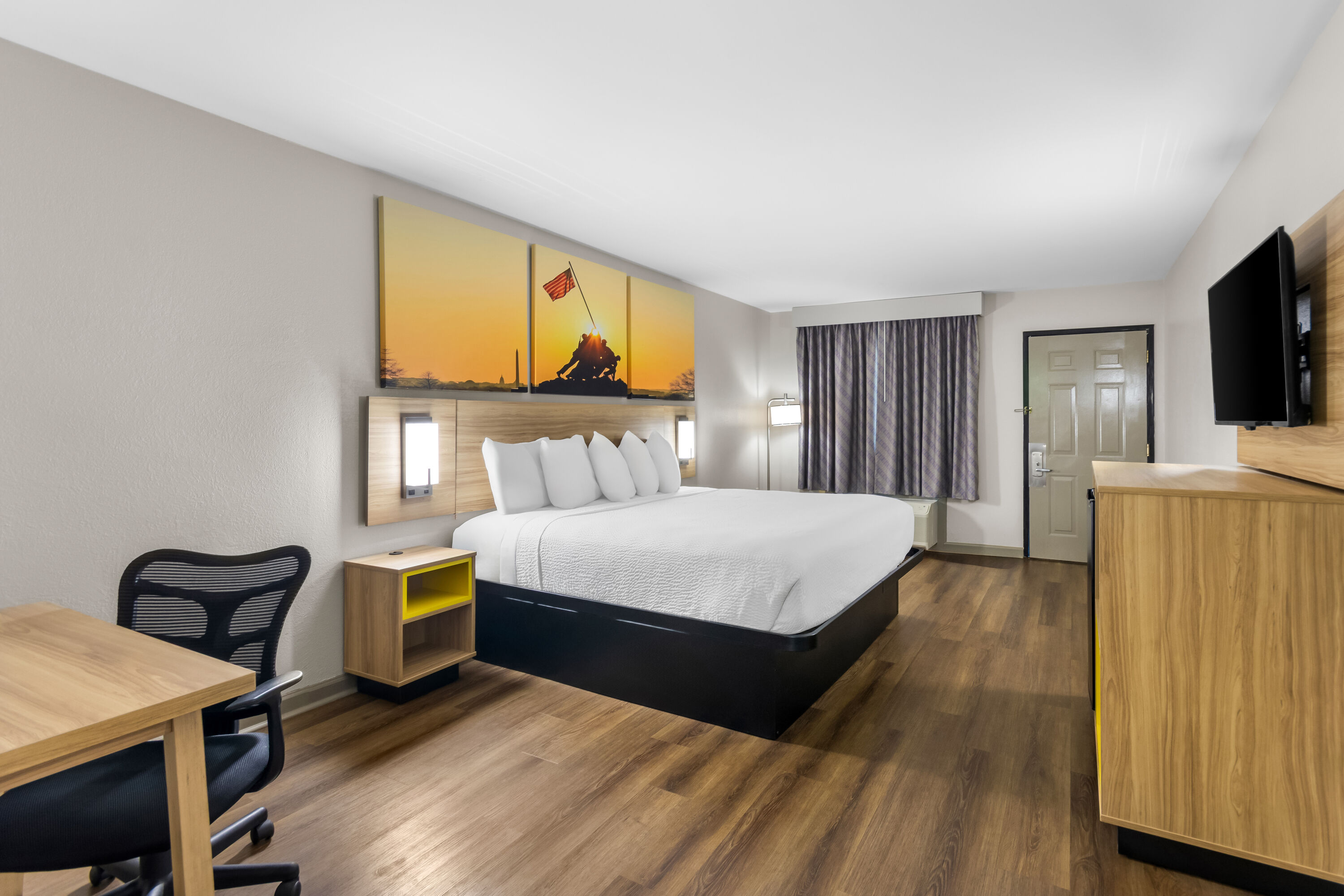 King bed guest room at the Days Inn by Wyndham Enterprise in Enterprise, Alabama