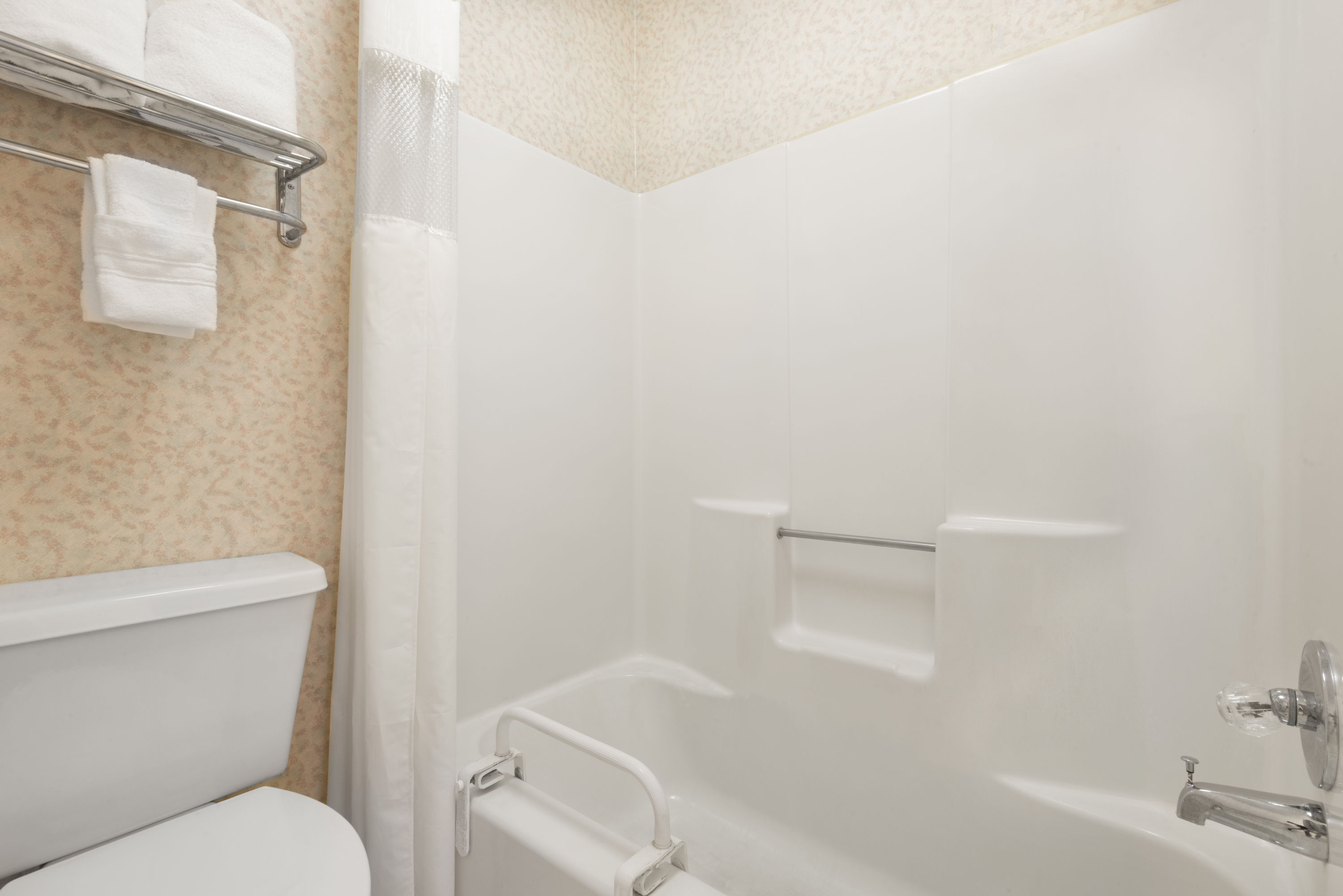 Guest room at the Days Inn by Wyndham Greenville in Greenville, Alabama