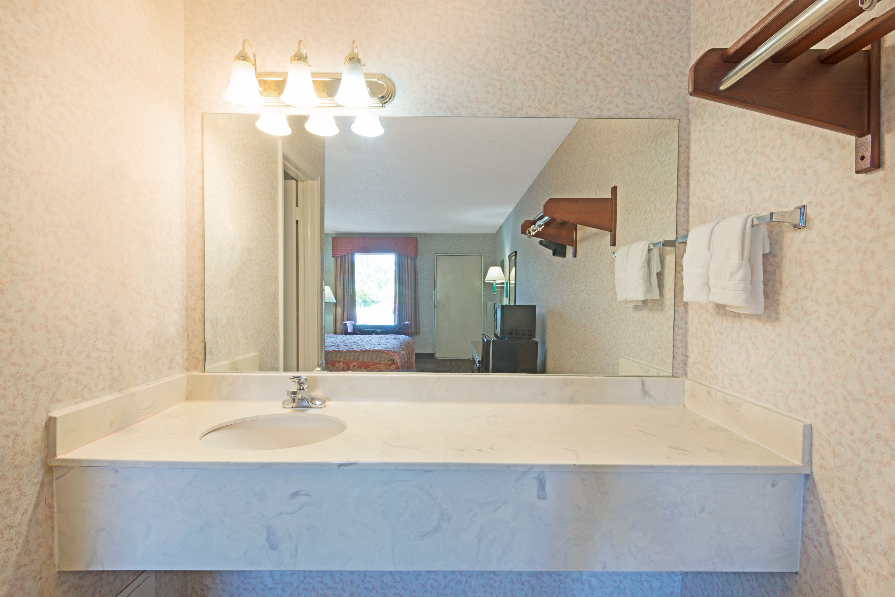 Guest room at the Days Inn by Wyndham Greenville in Greenville, Alabama