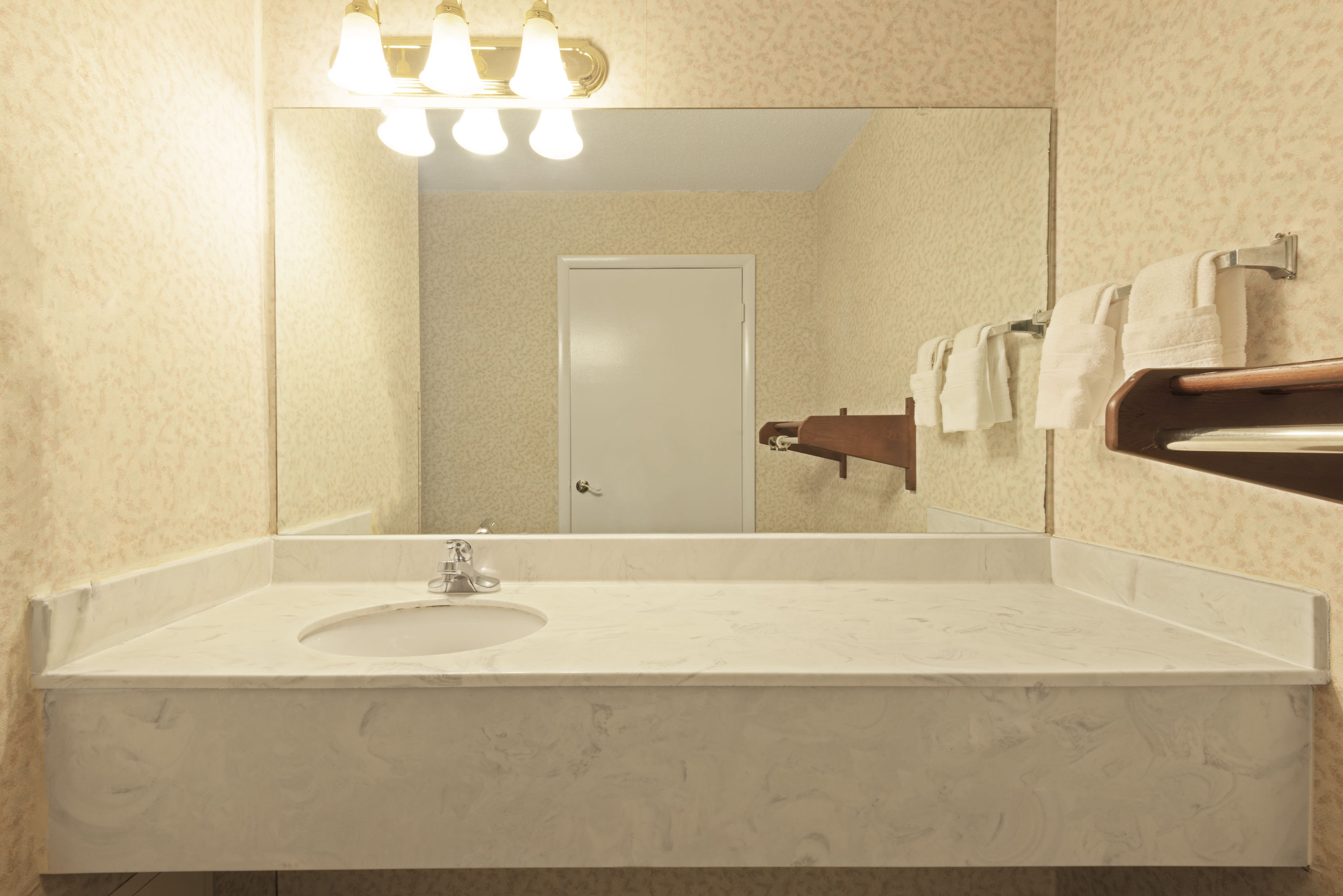 Guest room at the Days Inn by Wyndham Greenville in Greenville, Alabama