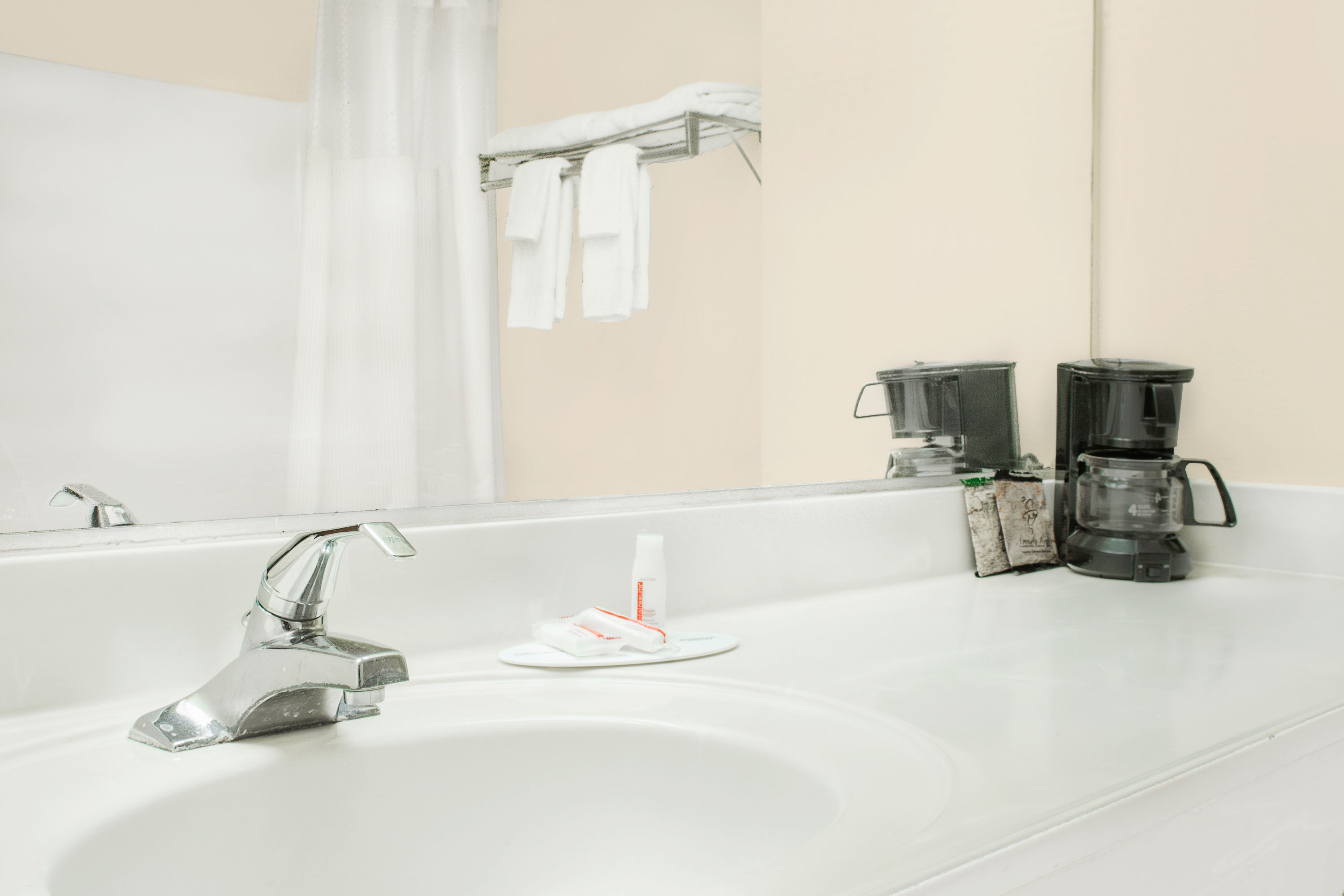 Guest room bath at the Days Inn by Wyndham Lincoln in Lincoln, Alabama