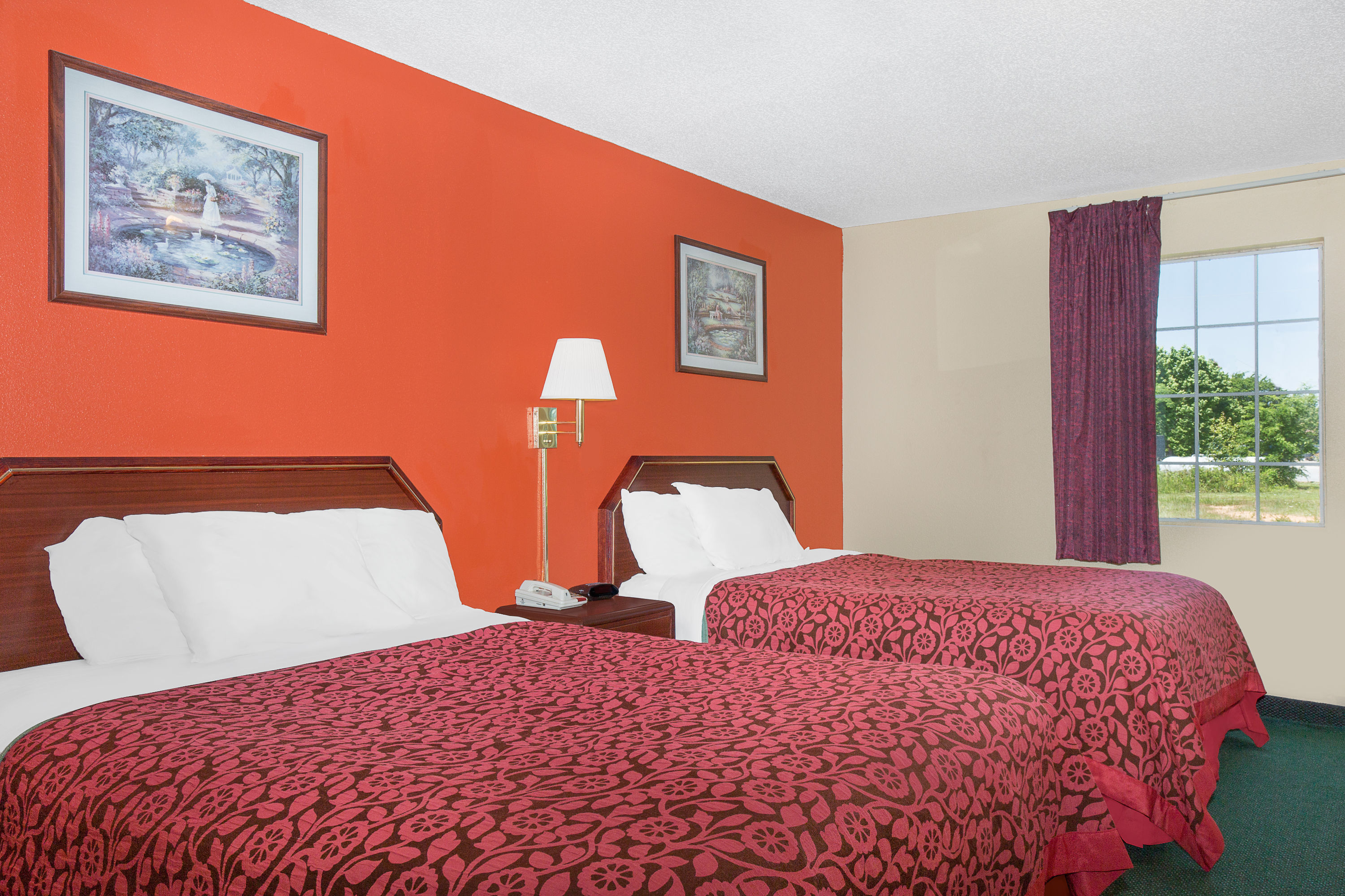Guest room at the Days Inn by Wyndham Lincoln in Lincoln, Alabama