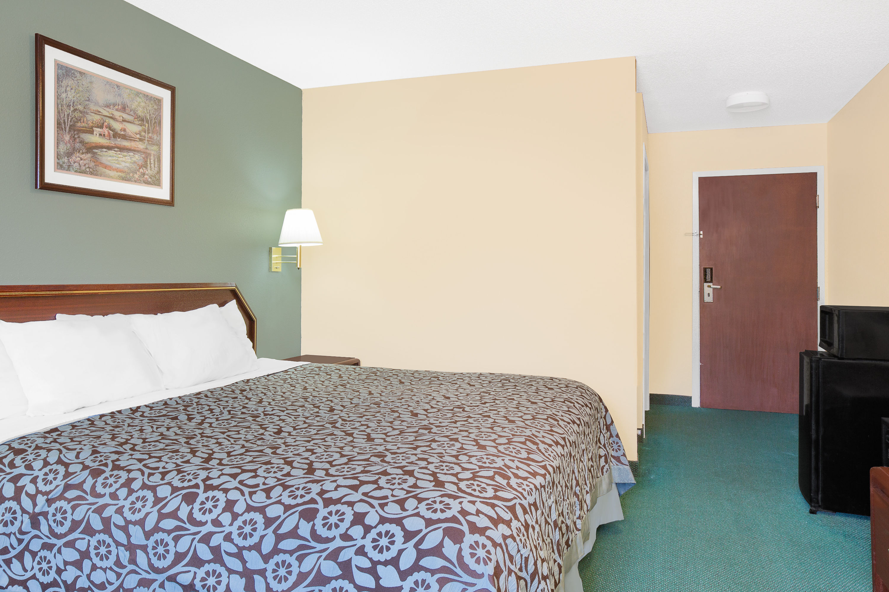 Guest room at the Days Inn by Wyndham Lincoln in Lincoln, Alabama