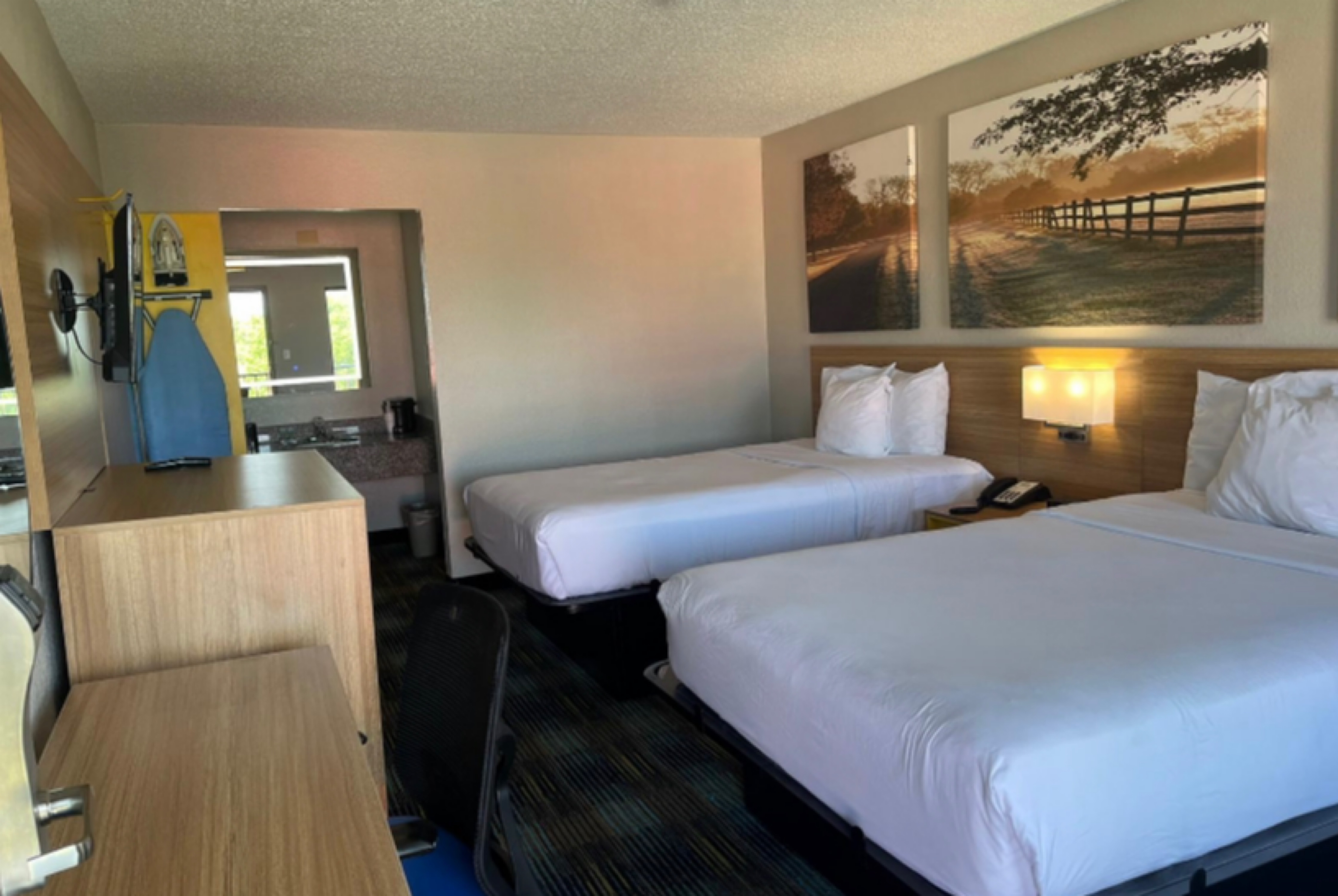 Guest room at the Days Inn & Suites by Wyndham Mobile in Mobile, Alabama