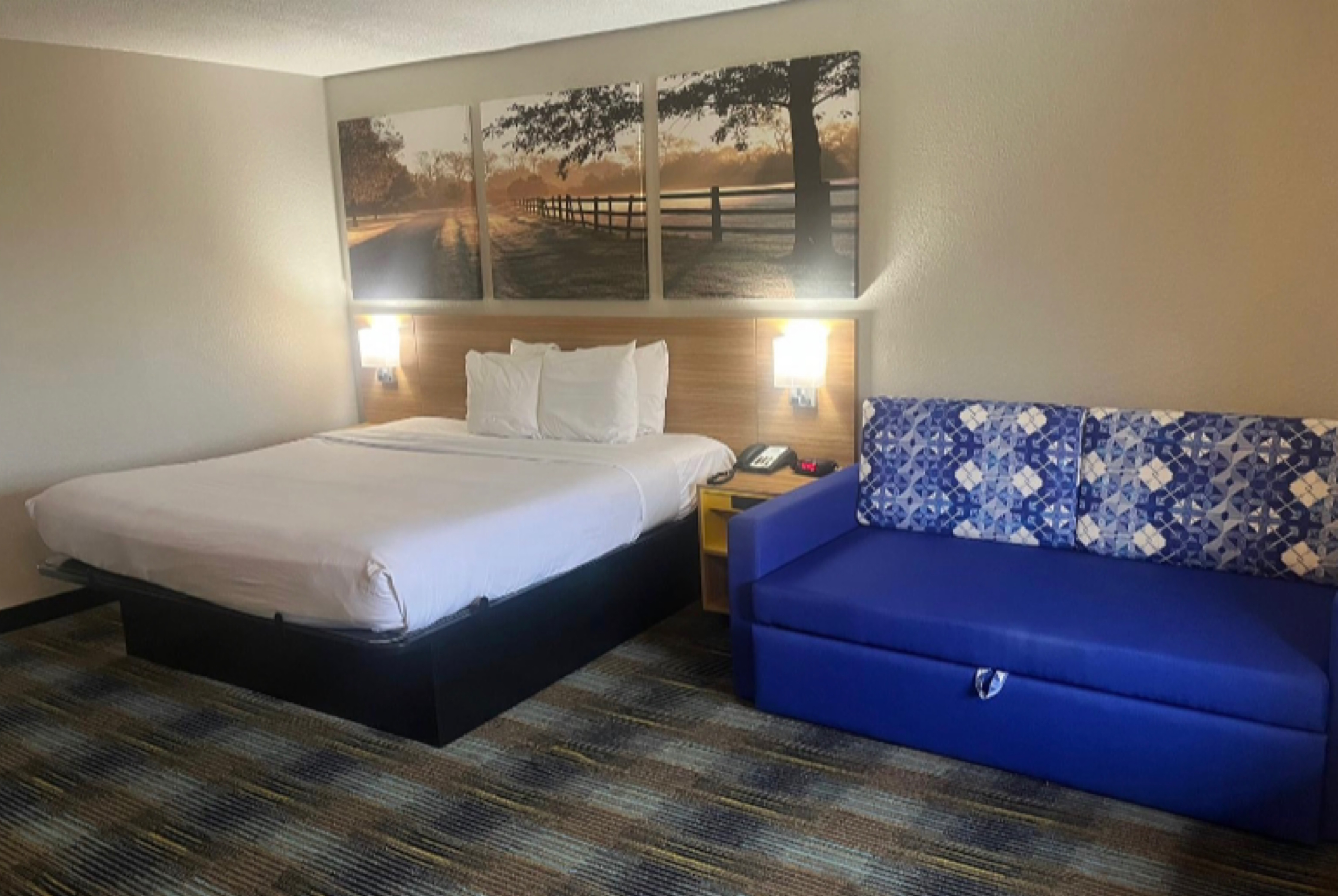 Guest room at the Days Inn & Suites by Wyndham Mobile in Mobile, Alabama