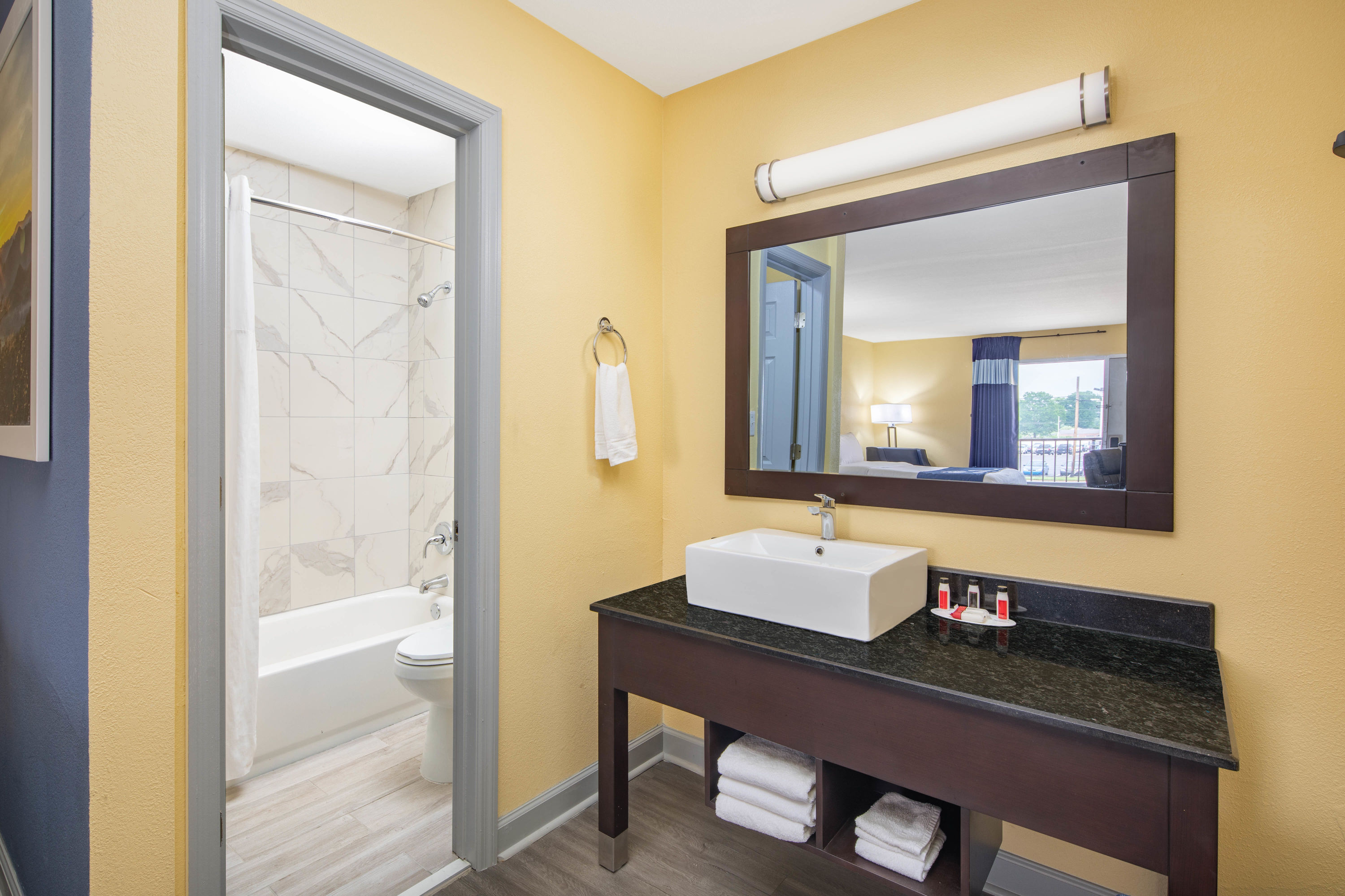 Guest room bath at the Days Inn by Wyndham Muscle Shoals Florence in Muscle Shoals, Alabama