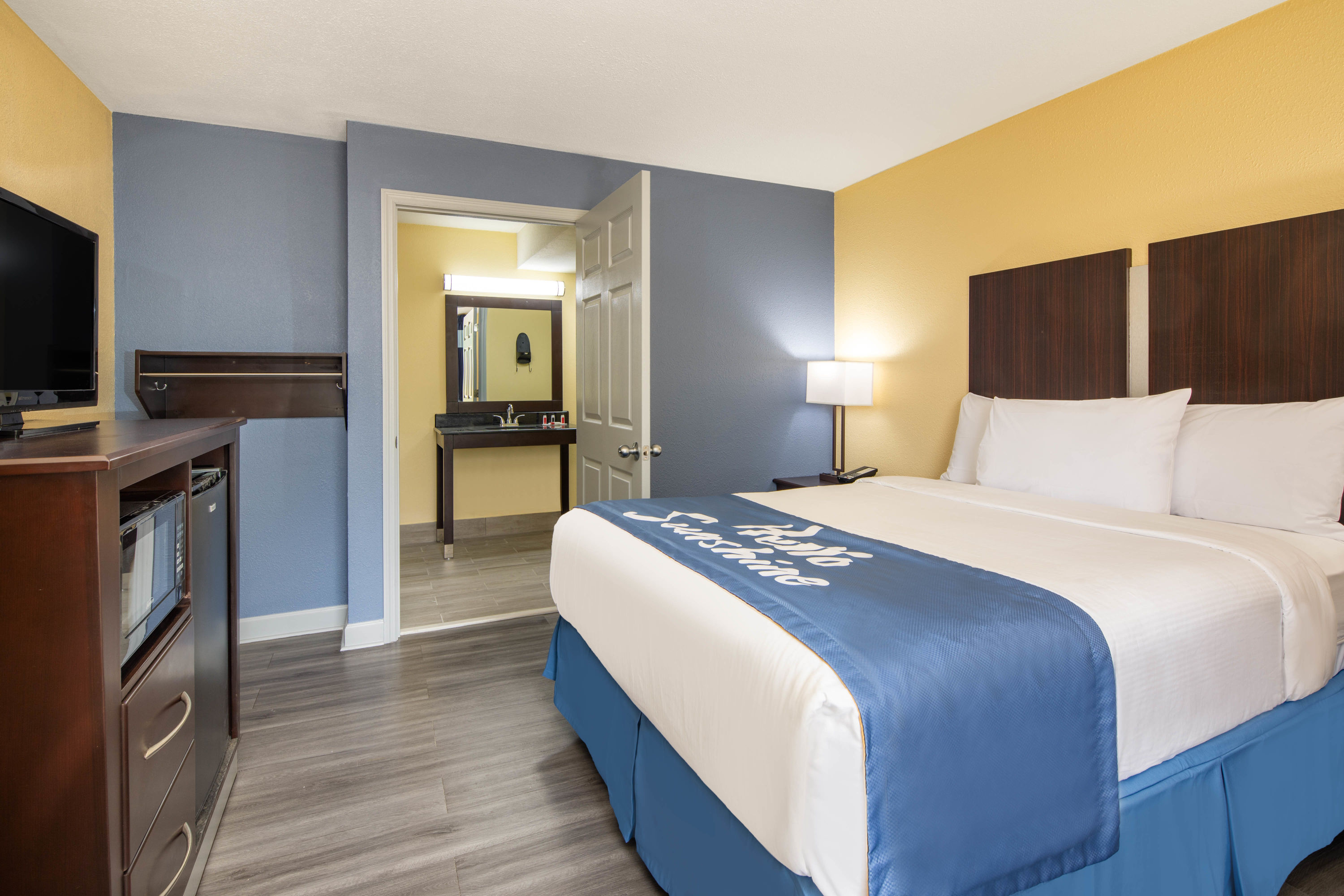 Guest room at the Days Inn by Wyndham Muscle Shoals Florence in Muscle Shoals, Alabama