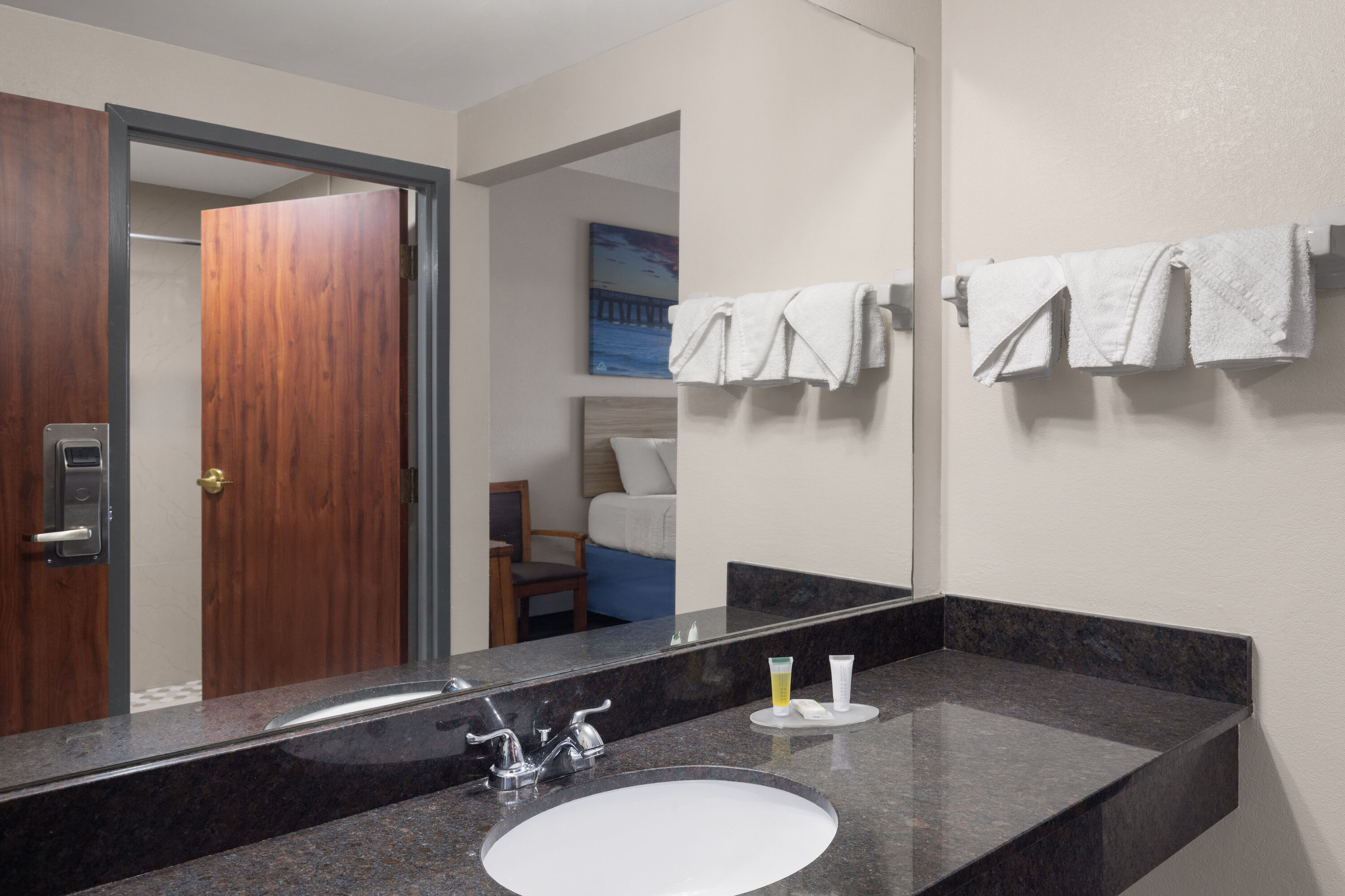 Guest room bath at the Days Inn by Wyndham Phenix City Near Fort Benning in Phenix City, Alabama