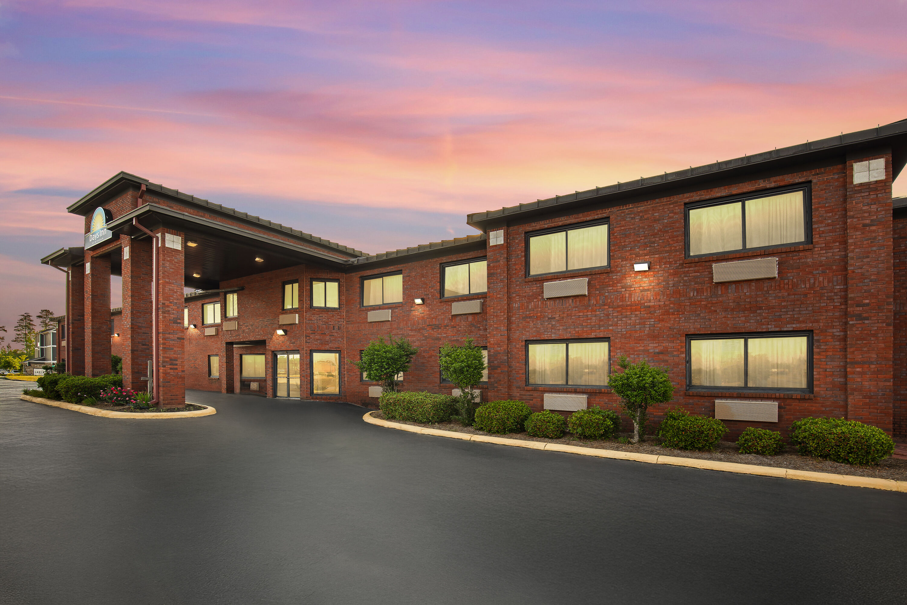 Exterior Dusk Image of Days Inn by Wyndham Phenix City Near Fort Benning hotel in Phenix City, Alabama