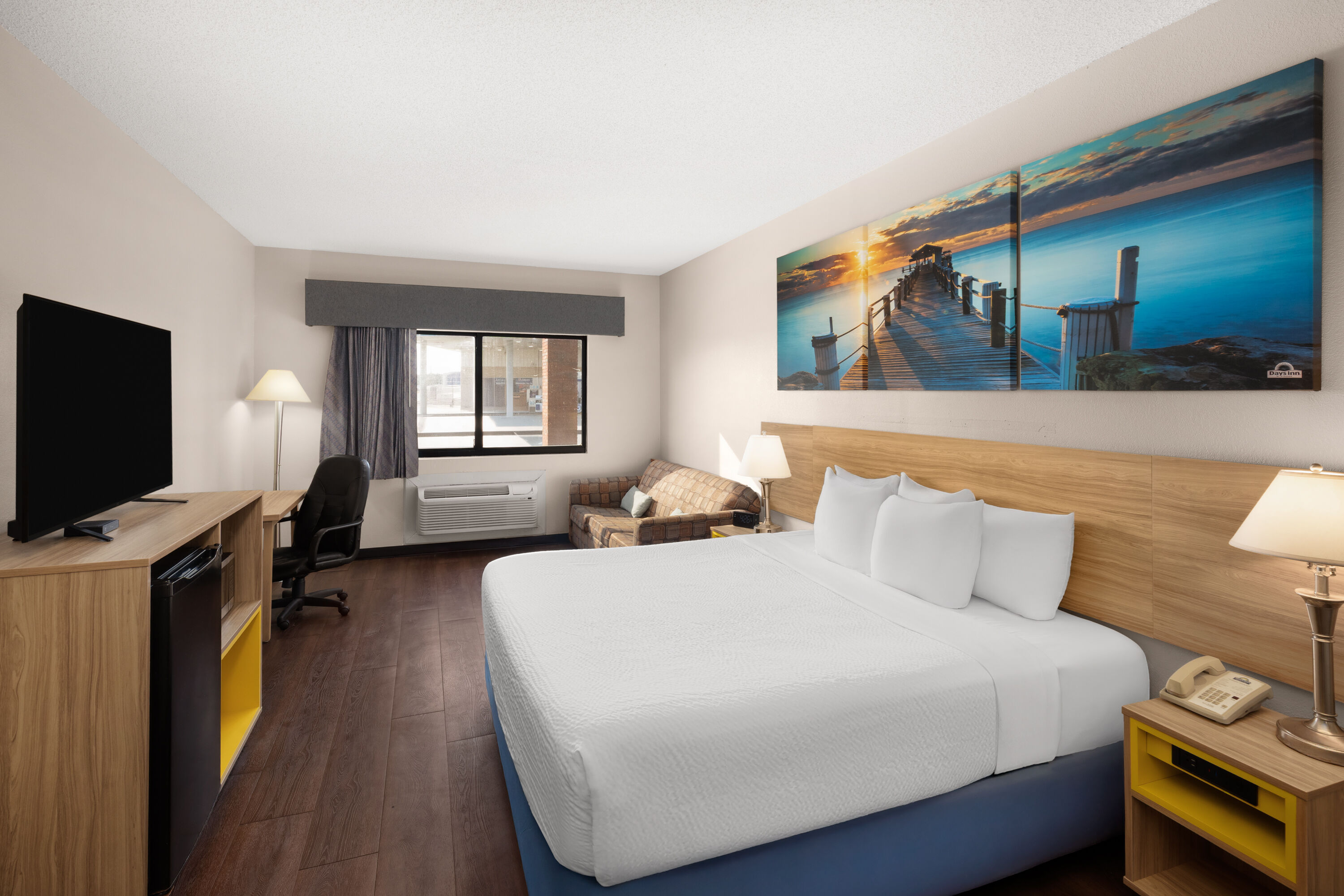 Guest room at the Days Inn by Wyndham Phenix City Near Fort Benning in Phenix City, Alabama