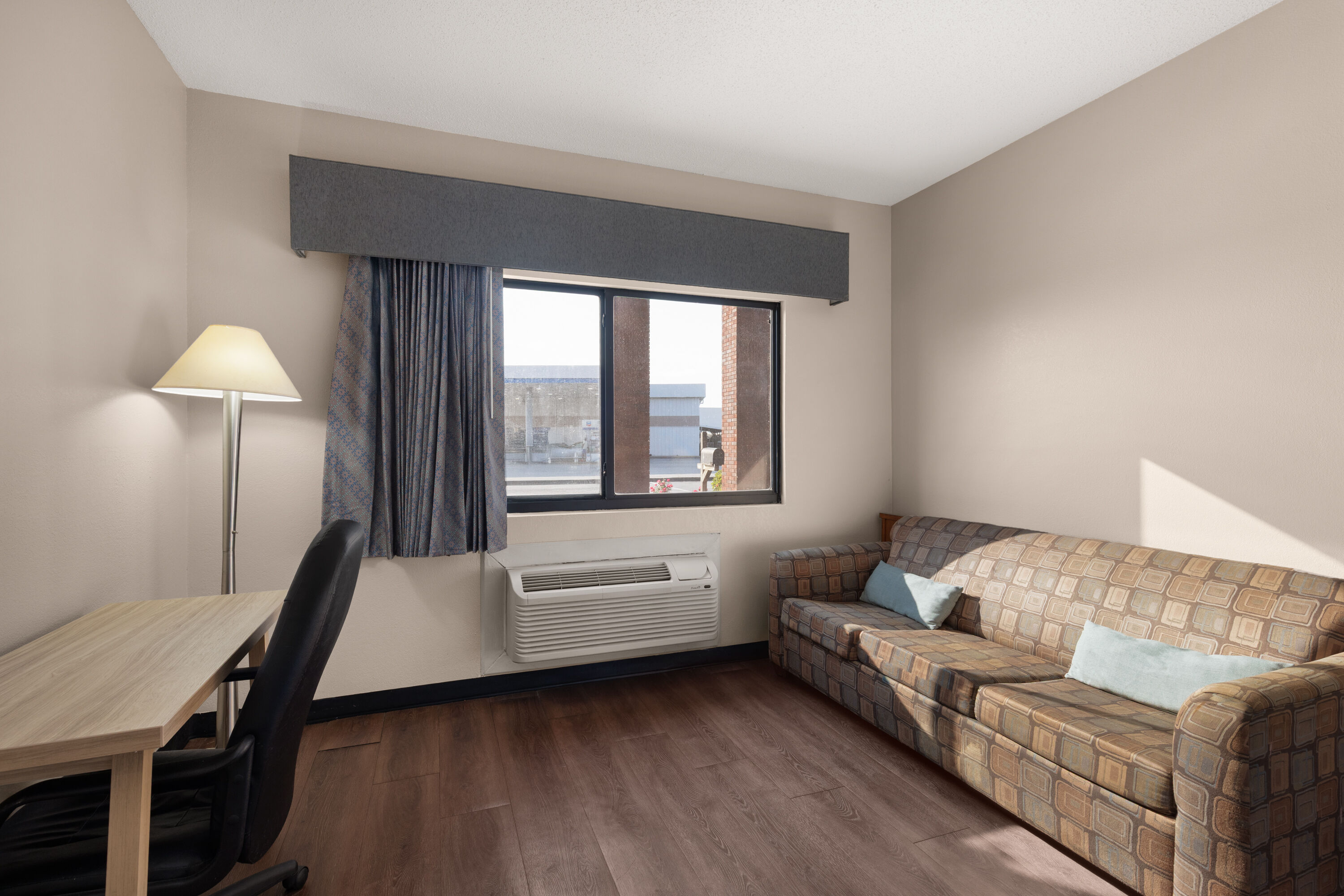 Guest room at the Days Inn by Wyndham Phenix City Near Fort Benning in Phenix City, Alabama