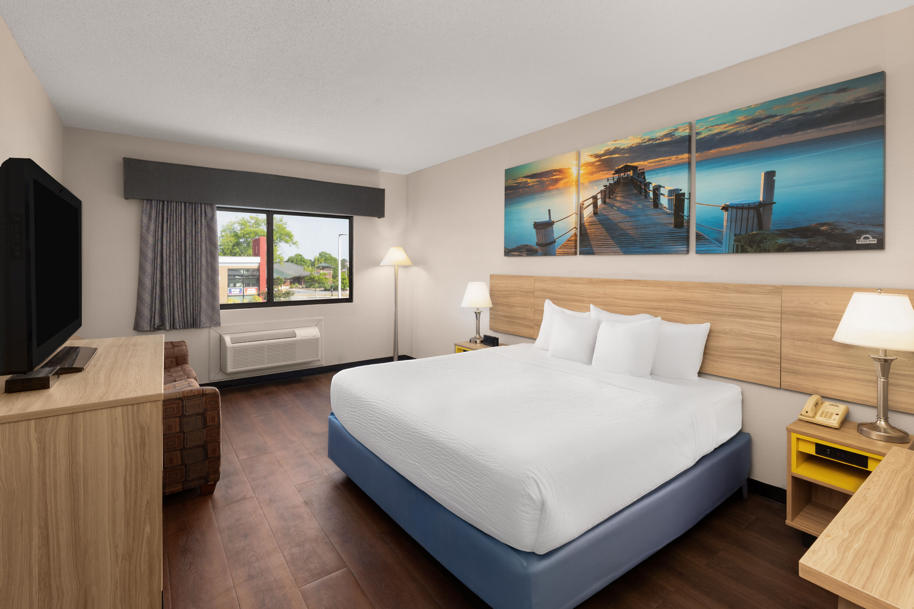 Guest room at the Days Inn by Wyndham Phenix City Near Fort Benning in Phenix City, Alabama